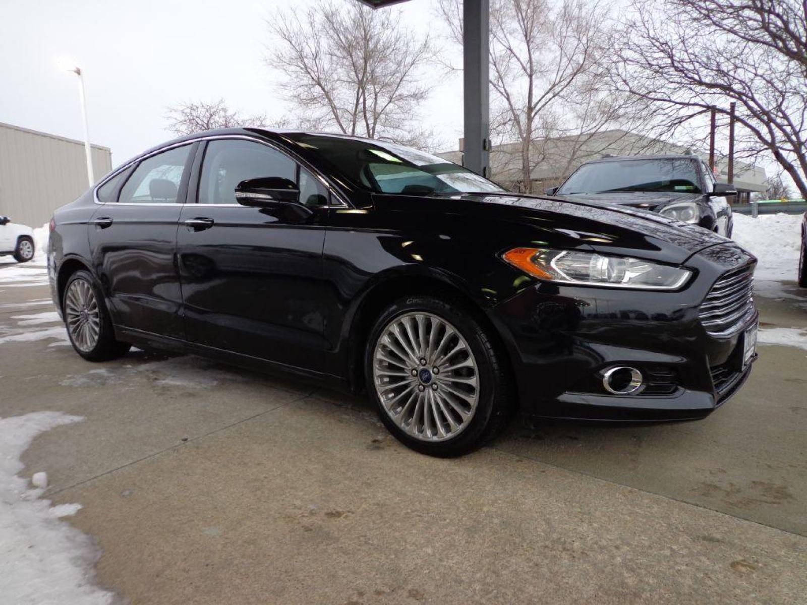 2015 BLACK FORD FUSION TITANIUM (3FA6P0K92FR) with an 2.0L engine, Automatic transmission, located at 6610 L St., Omaha, NE, 68117, (402) 731-7800, 41.212872, -96.014702 - SHARP LOW MILE TITANIUM PACKAGE WITH SUNROOF, DRIVERS ASSIST AND NEWER TIRES! *****We have found that most customers do the majority of their shopping online before visiting a dealership. For this reason we feel it necessary to have a competitive price on our used vehicles right up front. We sp - Photo #2