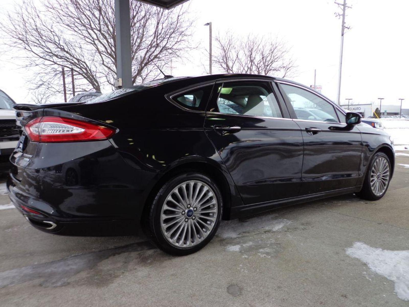 2015 BLACK FORD FUSION TITANIUM (3FA6P0K92FR) with an 2.0L engine, Automatic transmission, located at 6610 L St., Omaha, NE, 68117, (402) 731-7800, 41.212872, -96.014702 - SHARP LOW MILE TITANIUM PACKAGE WITH SUNROOF, DRIVERS ASSIST AND NEWER TIRES! *****We have found that most customers do the majority of their shopping online before visiting a dealership. For this reason we feel it necessary to have a competitive price on our used vehicles right up front. We sp - Photo #3