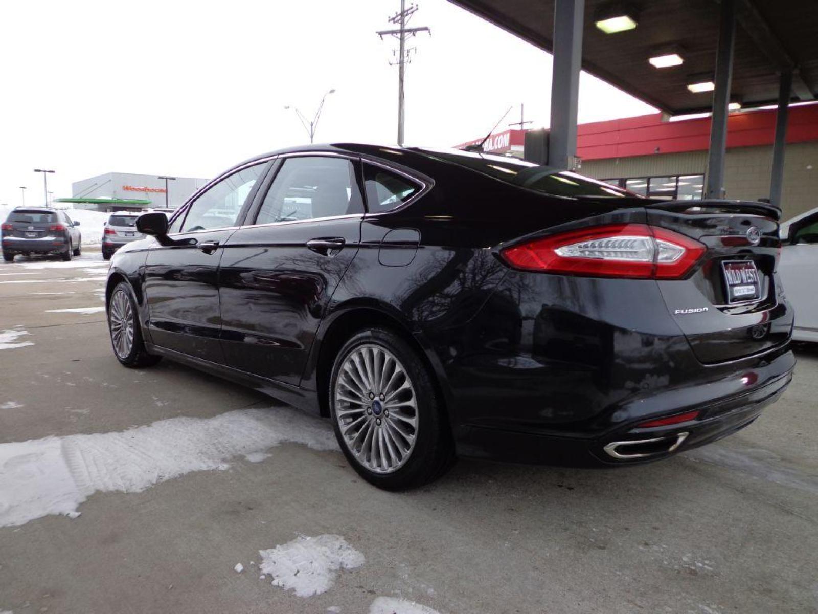 2015 BLACK FORD FUSION TITANIUM (3FA6P0K92FR) with an 2.0L engine, Automatic transmission, located at 6610 L St., Omaha, NE, 68117, (402) 731-7800, 41.212872, -96.014702 - SHARP LOW MILE TITANIUM PACKAGE WITH SUNROOF, DRIVERS ASSIST AND NEWER TIRES! *****We have found that most customers do the majority of their shopping online before visiting a dealership. For this reason we feel it necessary to have a competitive price on our used vehicles right up front. We sp - Photo #5