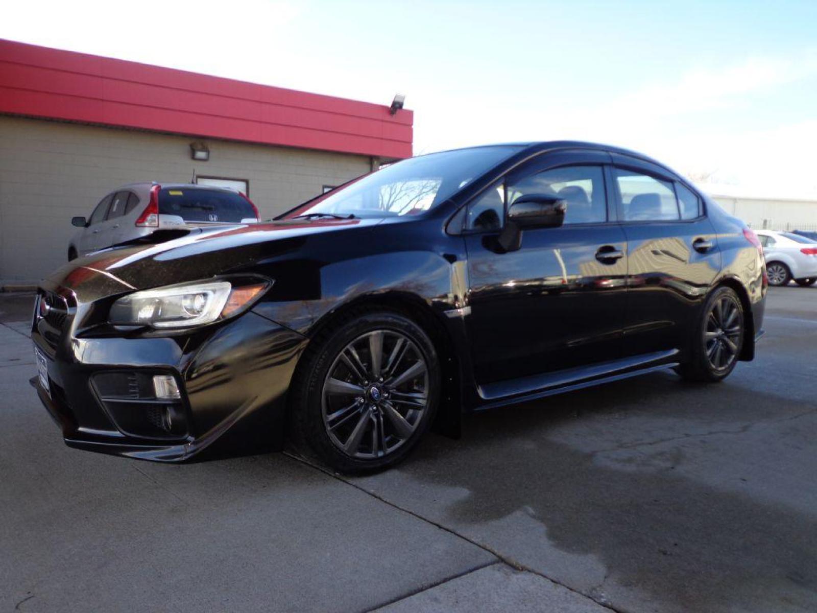 2015 BLACK SUBARU WRX LIMITED (JF1VA1G64F9) with an 2.0L engine, Manual transmission, located at 6610 L St., Omaha, NE, 68117, (402) 731-7800, 41.212872, -96.014702 - SHARP LOW MILE WRX WITH LOW MILEAGE, CLEAN CARFAX, HEATED LEATHER, BACKUP CAM, BLUETOOTH, SUNROOF AND NEW TIRES! *****We have found that most customers do the majority of their shopping online before visiting a dealership. For this reason we feel it necessary to have a competitive price on our - Photo #0