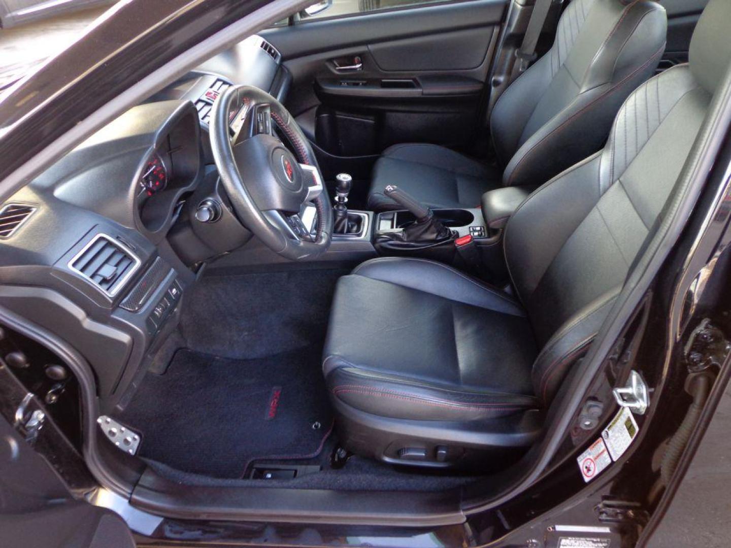 2015 BLACK SUBARU WRX LIMITED (JF1VA1G64F9) with an 2.0L engine, Manual transmission, located at 6610 L St., Omaha, NE, 68117, (402) 731-7800, 41.212872, -96.014702 - SHARP LOW MILE WRX WITH LOW MILEAGE, CLEAN CARFAX, HEATED LEATHER, BACKUP CAM, BLUETOOTH, SUNROOF AND NEW TIRES! *****We have found that most customers do the majority of their shopping online before visiting a dealership. For this reason we feel it necessary to have a competitive price on our - Photo#9