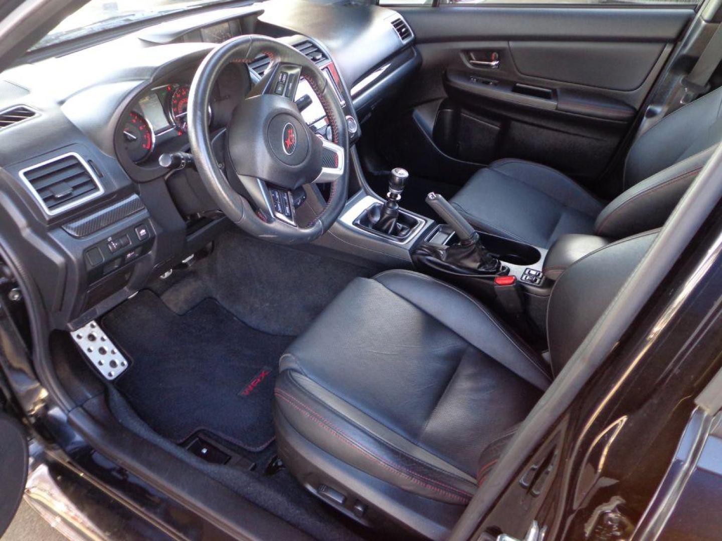 2015 BLACK SUBARU WRX LIMITED (JF1VA1G64F9) with an 2.0L engine, Manual transmission, located at 6610 L St., Omaha, NE, 68117, (402) 731-7800, 41.212872, -96.014702 - SHARP LOW MILE WRX WITH LOW MILEAGE, CLEAN CARFAX, HEATED LEATHER, BACKUP CAM, BLUETOOTH, SUNROOF AND NEW TIRES! *****We have found that most customers do the majority of their shopping online before visiting a dealership. For this reason we feel it necessary to have a competitive price on our - Photo#11