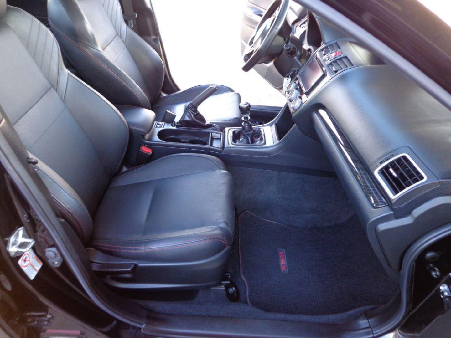 2015 BLACK SUBARU WRX LIMITED (JF1VA1G64F9) with an 2.0L engine, Manual transmission, located at 6610 L St., Omaha, NE, 68117, (402) 731-7800, 41.212872, -96.014702 - SHARP LOW MILE WRX WITH LOW MILEAGE, CLEAN CARFAX, HEATED LEATHER, BACKUP CAM, BLUETOOTH, SUNROOF AND NEW TIRES! *****We have found that most customers do the majority of their shopping online before visiting a dealership. For this reason we feel it necessary to have a competitive price on our - Photo#12