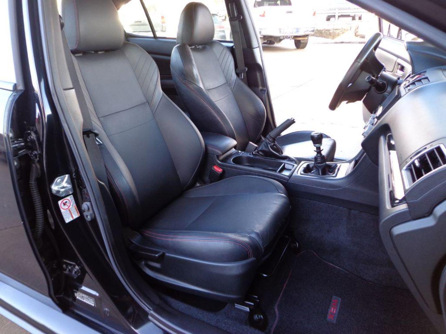 2015 BLACK SUBARU WRX LIMITED (JF1VA1G64F9) with an 2.0L engine, Manual transmission, located at 6610 L St., Omaha, NE, 68117, (402) 731-7800, 41.212872, -96.014702 - SHARP LOW MILE WRX WITH LOW MILEAGE, CLEAN CARFAX, HEATED LEATHER, BACKUP CAM, BLUETOOTH, SUNROOF AND NEW TIRES! *****We have found that most customers do the majority of their shopping online before visiting a dealership. For this reason we feel it necessary to have a competitive price on our - Photo#13