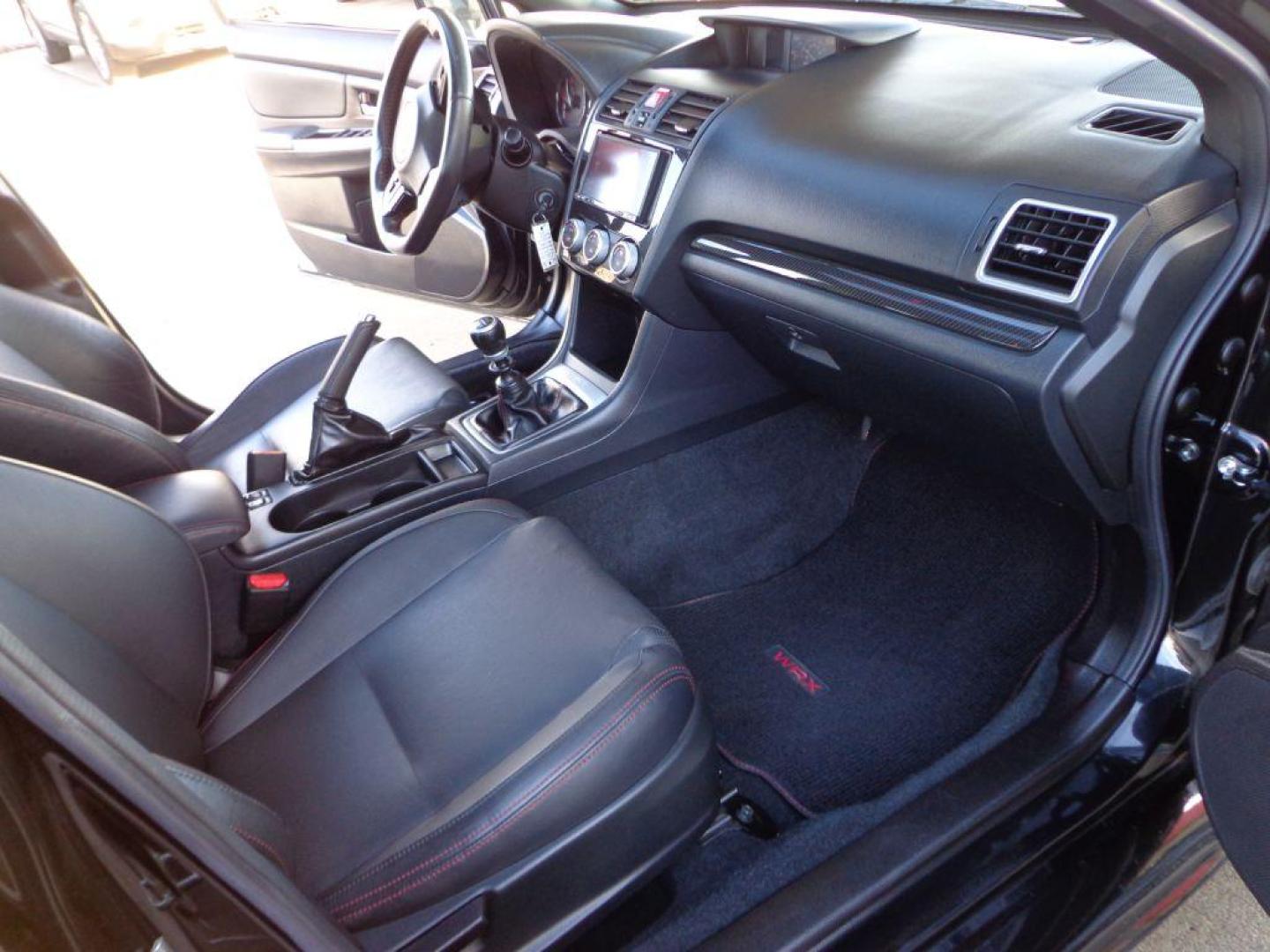 2015 BLACK SUBARU WRX LIMITED (JF1VA1G64F9) with an 2.0L engine, Manual transmission, located at 6610 L St., Omaha, NE, 68117, (402) 731-7800, 41.212872, -96.014702 - SHARP LOW MILE WRX WITH LOW MILEAGE, CLEAN CARFAX, HEATED LEATHER, BACKUP CAM, BLUETOOTH, SUNROOF AND NEW TIRES! *****We have found that most customers do the majority of their shopping online before visiting a dealership. For this reason we feel it necessary to have a competitive price on our - Photo#14