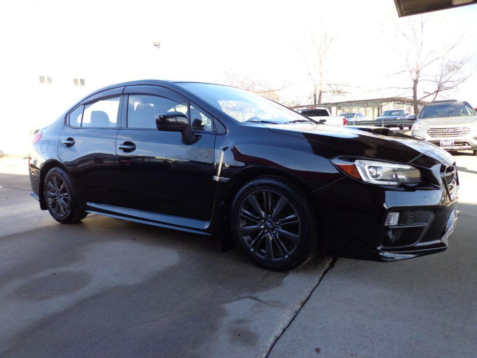2015 BLACK SUBARU WRX LIMITED (JF1VA1G64F9) with an 2.0L engine, Manual transmission, located at 6610 L St., Omaha, NE, 68117, (402) 731-7800, 41.212872, -96.014702 - SHARP LOW MILE WRX WITH LOW MILEAGE, CLEAN CARFAX, HEATED LEATHER, BACKUP CAM, BLUETOOTH, SUNROOF AND NEW TIRES! *****We have found that most customers do the majority of their shopping online before visiting a dealership. For this reason we feel it necessary to have a competitive price on our - Photo #2