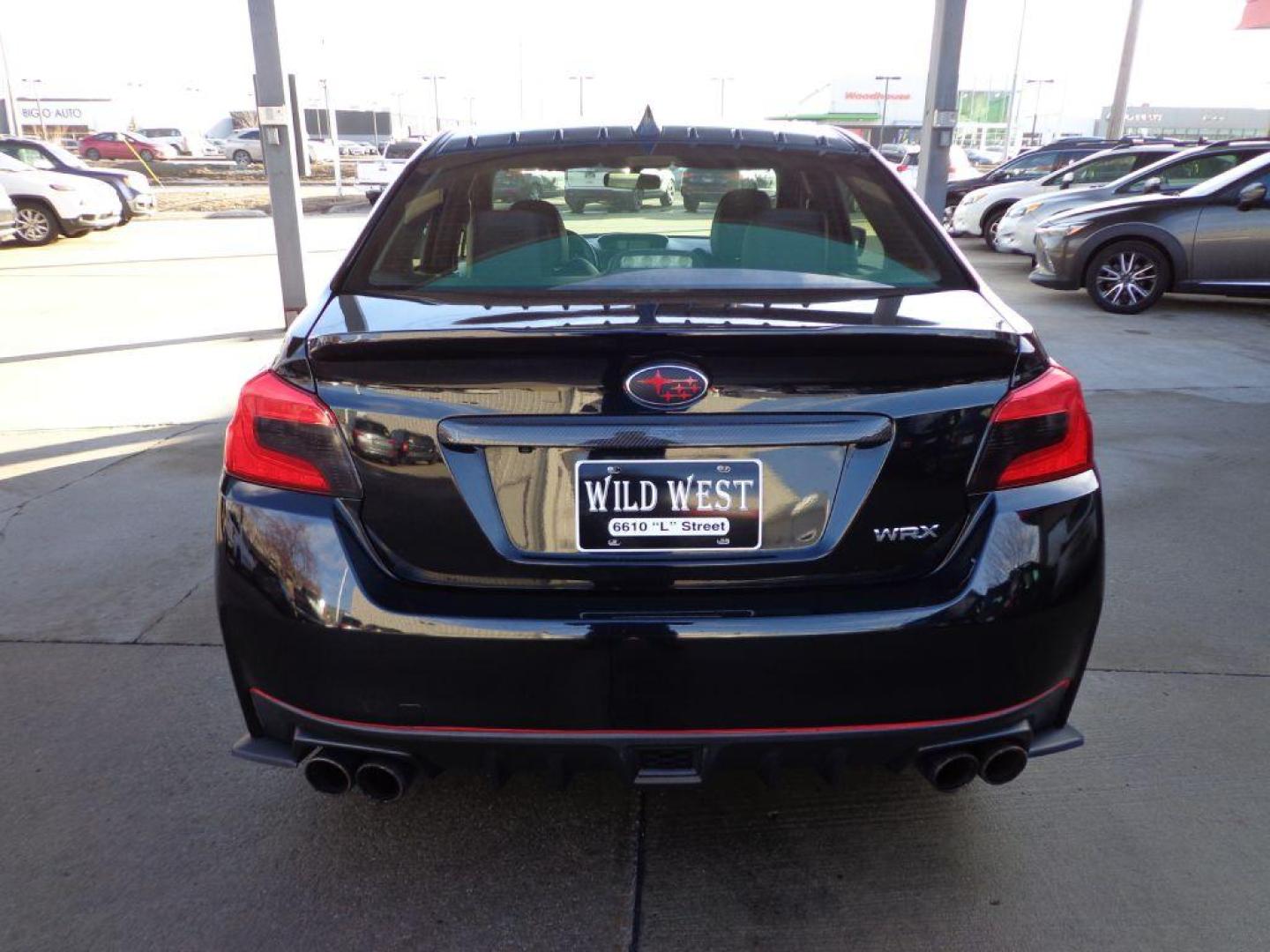 2015 BLACK SUBARU WRX LIMITED (JF1VA1G64F9) with an 2.0L engine, Manual transmission, located at 6610 L St., Omaha, NE, 68117, (402) 731-7800, 41.212872, -96.014702 - SHARP LOW MILE WRX WITH LOW MILEAGE, CLEAN CARFAX, HEATED LEATHER, BACKUP CAM, BLUETOOTH, SUNROOF AND NEW TIRES! *****We have found that most customers do the majority of their shopping online before visiting a dealership. For this reason we feel it necessary to have a competitive price on our - Photo#4