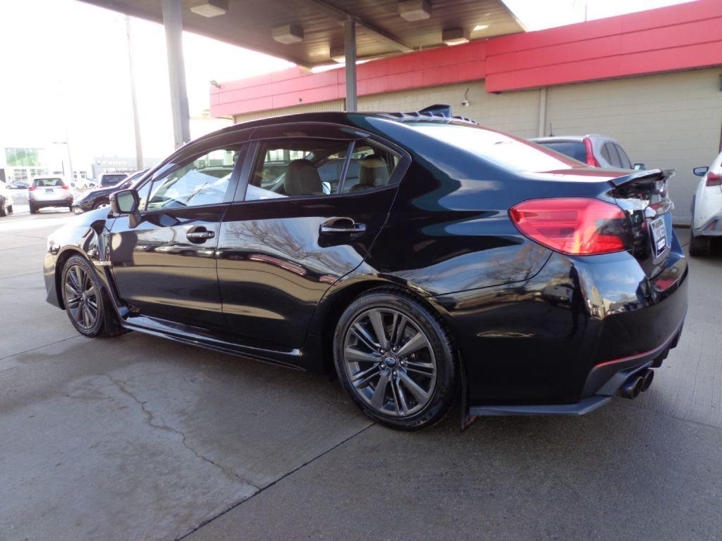 2015 BLACK SUBARU WRX LIMITED (JF1VA1G64F9) with an 2.0L engine, Manual transmission, located at 6610 L St., Omaha, NE, 68117, (402) 731-7800, 41.212872, -96.014702 - SHARP LOW MILE WRX WITH LOW MILEAGE, CLEAN CARFAX, HEATED LEATHER, BACKUP CAM, BLUETOOTH, SUNROOF AND NEW TIRES! *****We have found that most customers do the majority of their shopping online before visiting a dealership. For this reason we feel it necessary to have a competitive price on our - Photo#5
