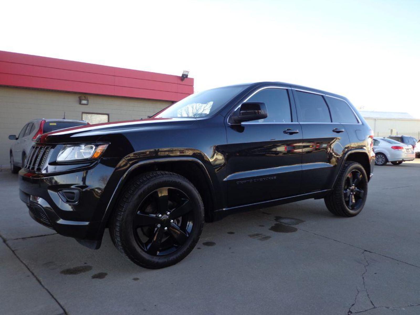 2014 BLACK JEEP GRAND CHEROKEE ALTITUDE (1C4RJFAG7EC) with an 3.6L engine, Automatic transmission, located at 6610 L St., Omaha, NE, 68117, (402) 731-7800, 41.212872, -96.014702 - 1-OWNER CLEAN CARFAX LOW MILEAGE LOADED WITH BLACKOUT PACKAGE, NAV, HEATED SEATS/STEERING WHEEL, SUNROOF, REMOTE START AND NEWER 20' TIRES *****We have found that most customers do the majority of their shopping online before visiting a dealership. For this reason we feel it necessary to have a - Photo #0