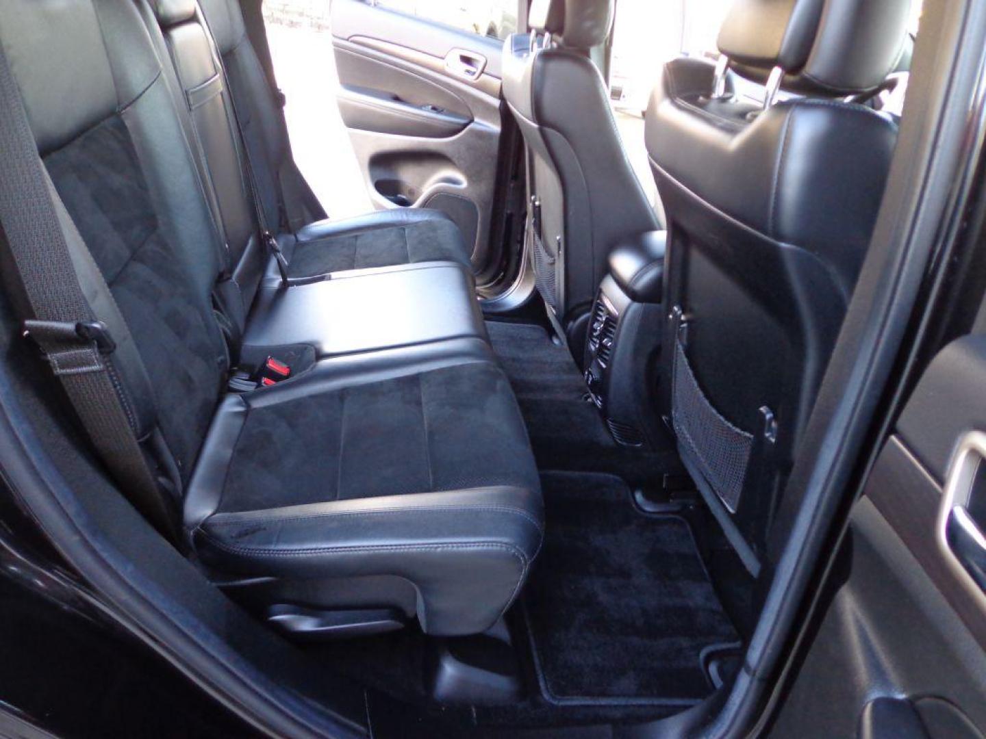 2014 BLACK JEEP GRAND CHEROKEE ALTITUDE (1C4RJFAG7EC) with an 3.6L engine, Automatic transmission, located at 6610 L St., Omaha, NE, 68117, (402) 731-7800, 41.212872, -96.014702 - 1-OWNER CLEAN CARFAX LOW MILEAGE LOADED WITH BLACKOUT PACKAGE, NAV, HEATED SEATS/STEERING WHEEL, SUNROOF, REMOTE START AND NEWER 20' TIRES *****We have found that most customers do the majority of their shopping online before visiting a dealership. For this reason we feel it necessary to have a - Photo#18