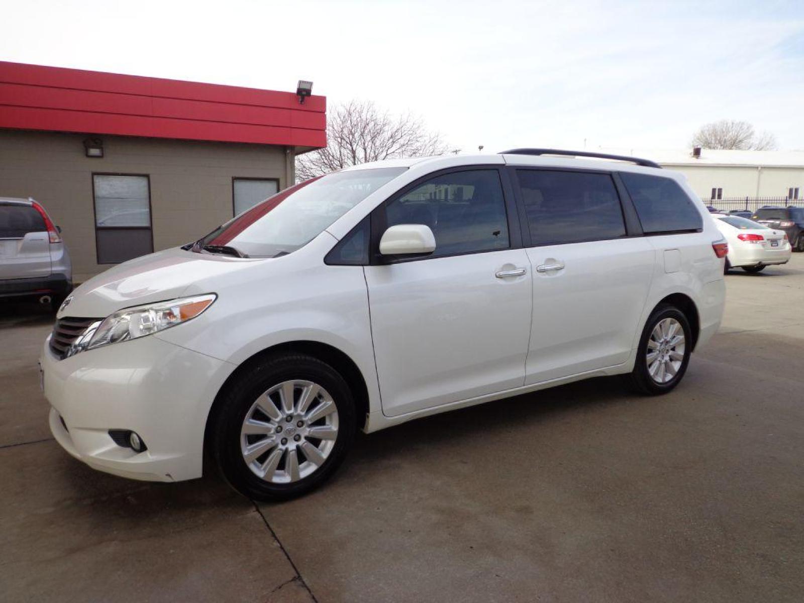 2015 WHITE TOYOTA SIENNA XLE (5TDDK3DC2FS) with an 3.5L engine, Automatic transmission, located at 6610 L St., Omaha, NE, 68117, (402) 731-7800, 41.212872, -96.014702 - 1-OWNER CLEAN CARFAX LOW MILEAGE AWD WITH A SUNROOF, NAV, REAR BUCKETS, BLIND SPOT ASSIST AND NEWER TIRES! *****We have found that most customers do the majority of their shopping online before visiting a dealership. For this reason we feel it necessary to have a competitive price on our used v - Photo #0