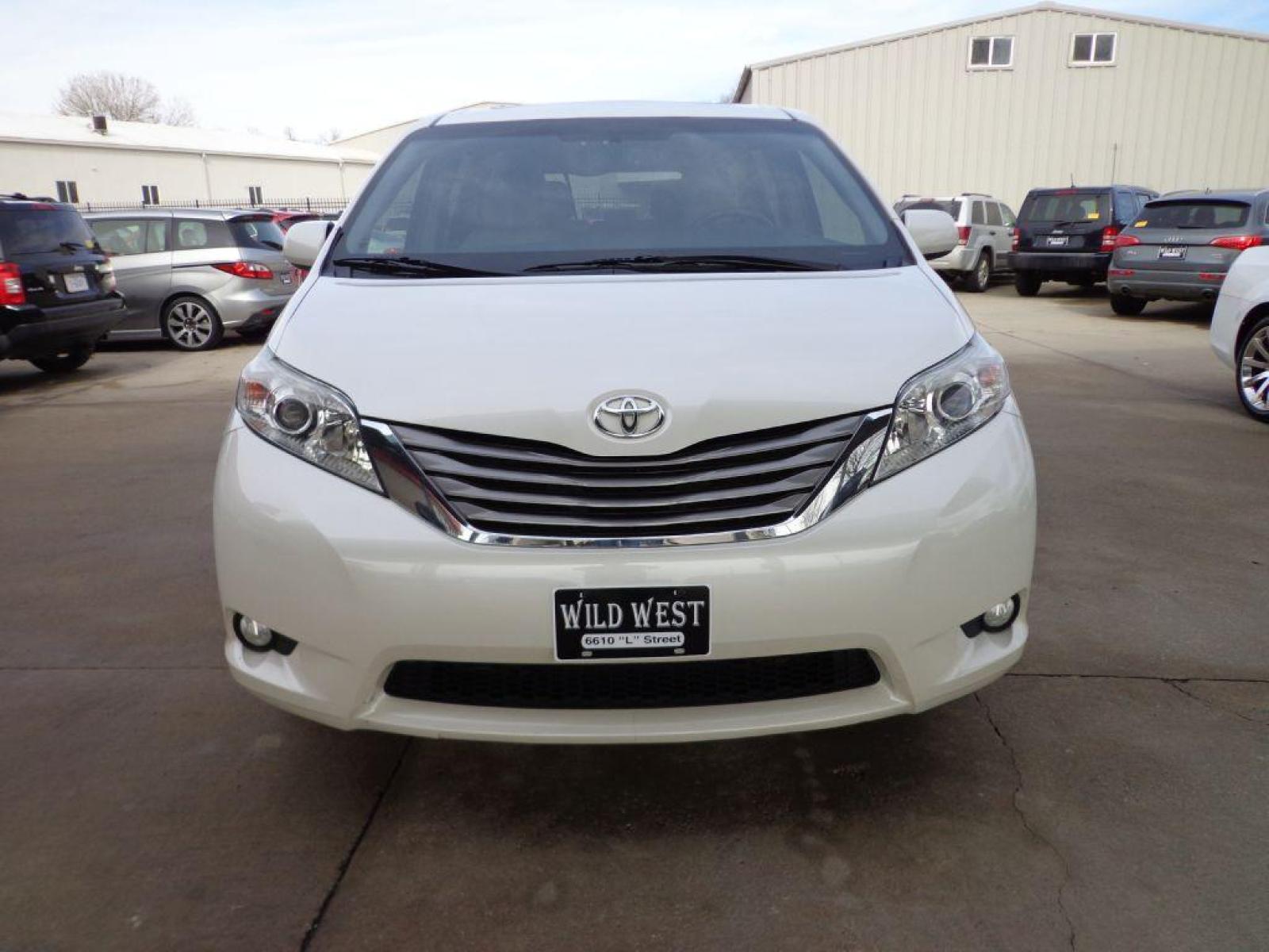 2015 WHITE TOYOTA SIENNA XLE (5TDDK3DC2FS) with an 3.5L engine, Automatic transmission, located at 6610 L St., Omaha, NE, 68117, (402) 731-7800, 41.212872, -96.014702 - 1-OWNER CLEAN CARFAX LOW MILEAGE AWD WITH A SUNROOF, NAV, REAR BUCKETS, BLIND SPOT ASSIST AND NEWER TIRES! *****We have found that most customers do the majority of their shopping online before visiting a dealership. For this reason we feel it necessary to have a competitive price on our used v - Photo #1