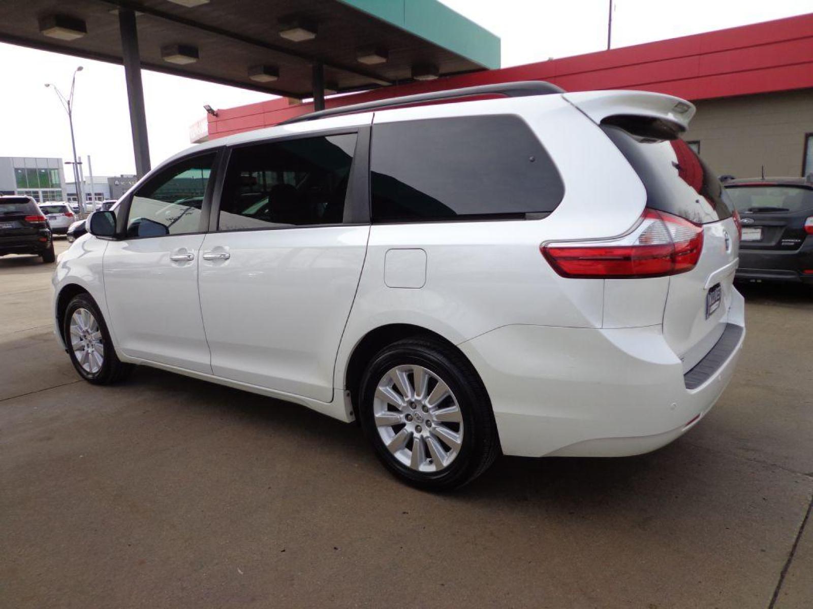 2015 WHITE TOYOTA SIENNA XLE (5TDDK3DC2FS) with an 3.5L engine, Automatic transmission, located at 6610 L St., Omaha, NE, 68117, (402) 731-7800, 41.212872, -96.014702 - 1-OWNER CLEAN CARFAX LOW MILEAGE AWD WITH A SUNROOF, NAV, REAR BUCKETS, BLIND SPOT ASSIST AND NEWER TIRES! *****We have found that most customers do the majority of their shopping online before visiting a dealership. For this reason we feel it necessary to have a competitive price on our used v - Photo #5