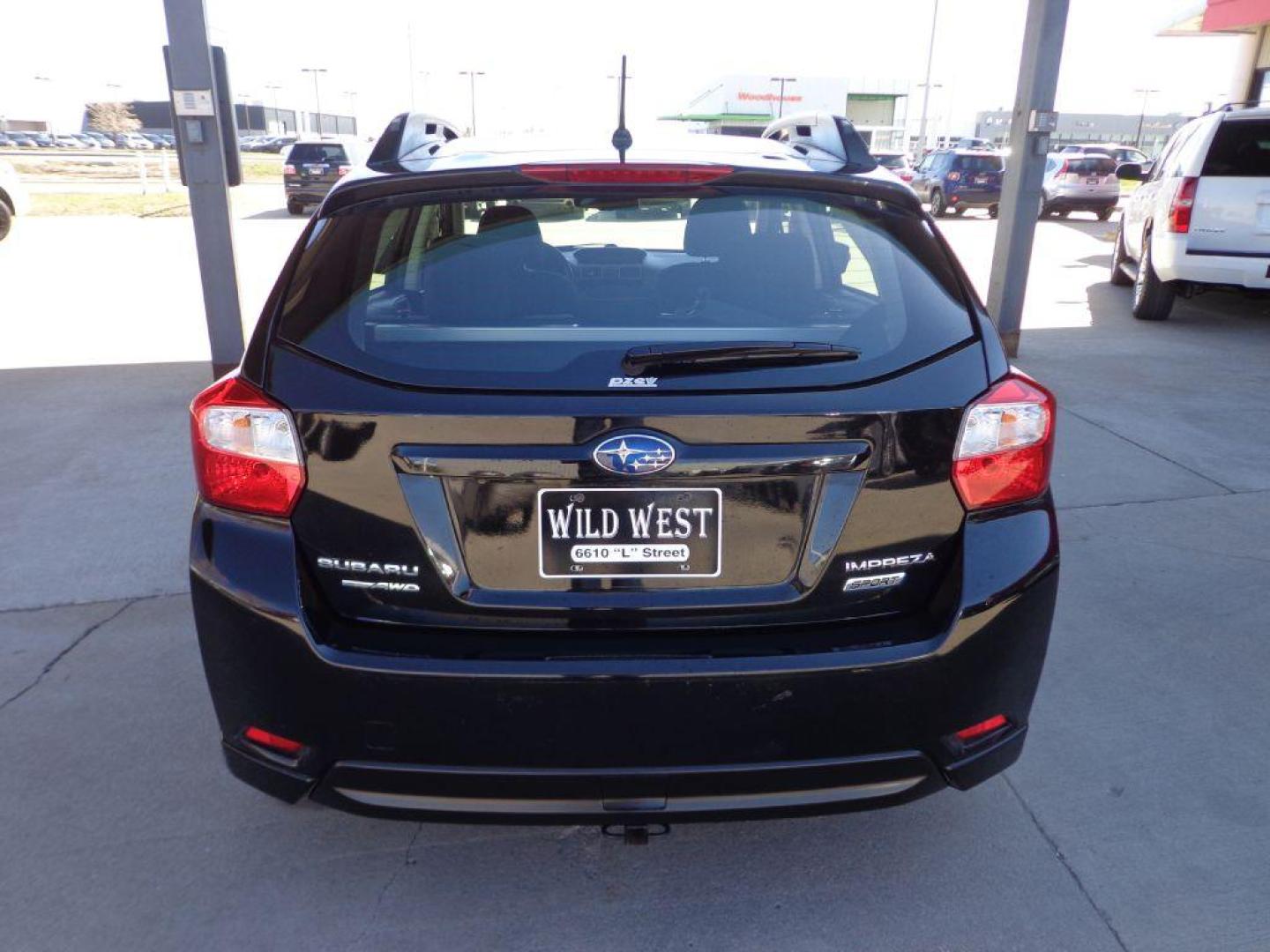 2015 BLACK SUBARU IMPREZA SPORT (JF1GPAT61FH) with an 2.0L engine, Continuously Variable transmission, located at 6610 L St., Omaha, NE, 68117, (402) 731-7800, 41.212872, -96.014702 - 1-OWNER CLEAN CARFAX LOW MILEAGE WITH HEATED SEATS, SUNROOF AND NEWER TIRES! *****We have found that most customers do the majority of their shopping online before visiting a dealership. For this reason we feel it necessary to have a competitive price on our used vehicles right up front. We spe - Photo#4