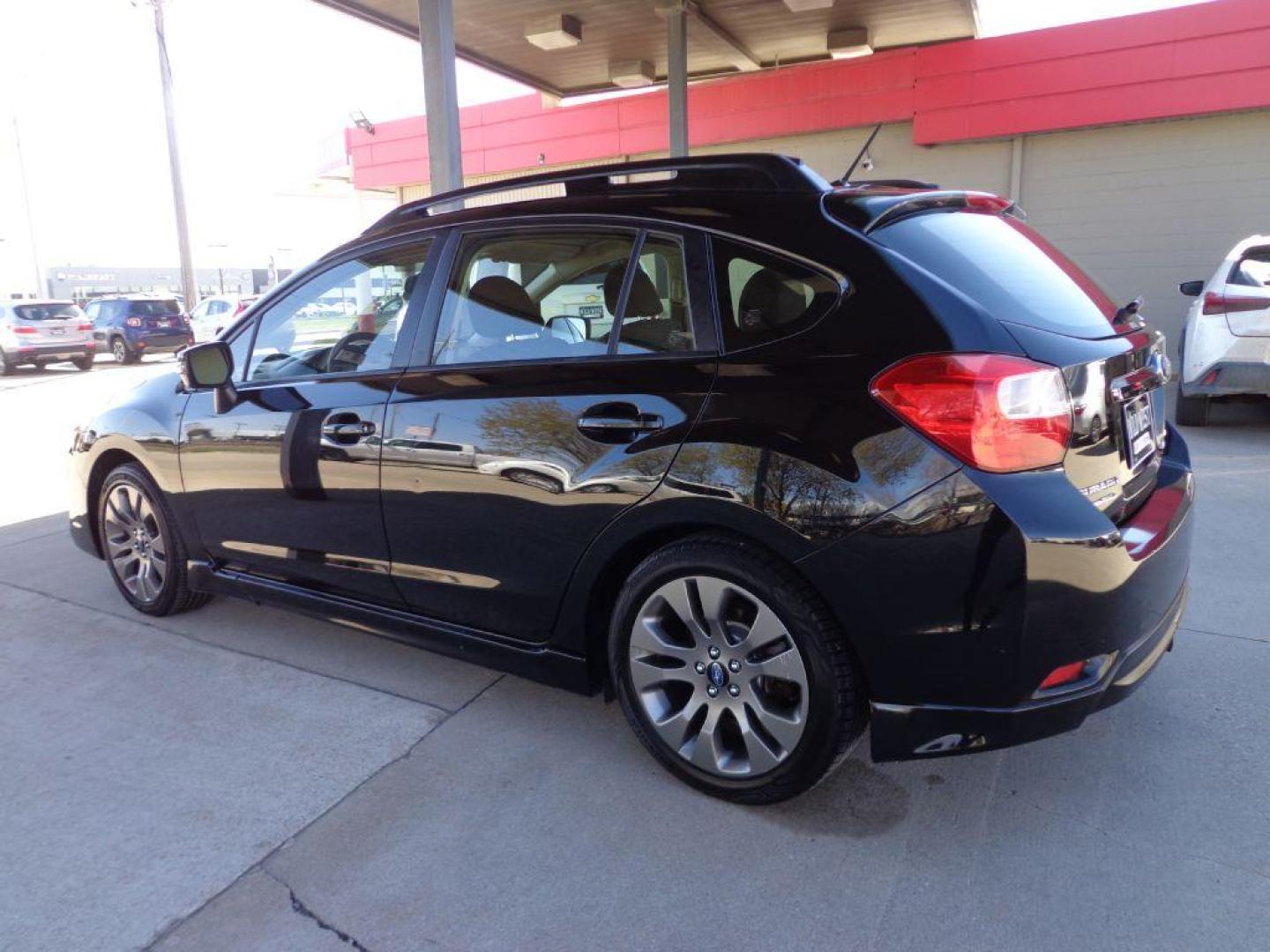 2015 BLACK SUBARU IMPREZA SPORT (JF1GPAT61FH) with an 2.0L engine, Continuously Variable transmission, located at 6610 L St., Omaha, NE, 68117, (402) 731-7800, 41.212872, -96.014702 - 1-OWNER CLEAN CARFAX LOW MILEAGE WITH HEATED SEATS, SUNROOF AND NEWER TIRES! *****We have found that most customers do the majority of their shopping online before visiting a dealership. For this reason we feel it necessary to have a competitive price on our used vehicles right up front. We spe - Photo#5