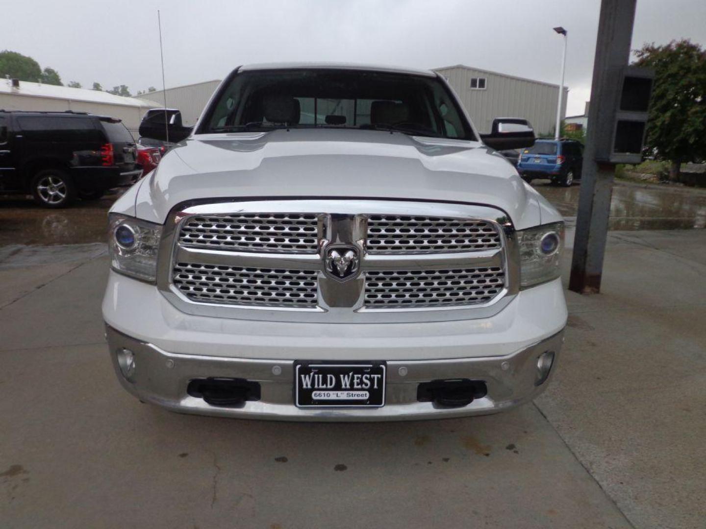 2014 WHITE RAM 1500 LARAMIE (1C6RR7VT9ES) with an 5.7L engine, Automatic transmission, located at 6610 L St., Omaha, NE, 68117, (402) 731-7800, 41.212872, -96.014702 - SHARP LARAMIE 2-OWNERS CLEAN CARFAX LOW MILEAGE LOADED WITH FRONT HEATED/COOLED SEATS, REAR HEATED SEATS, SUNROOF, NAV, BACKUP CAM, POWER REAR WINDOW, ALPINE AUDIO, REMOTE START AND MUCH MORE! *****We have found that most customers do the majority of their shopping online before visiting a de - Photo#1