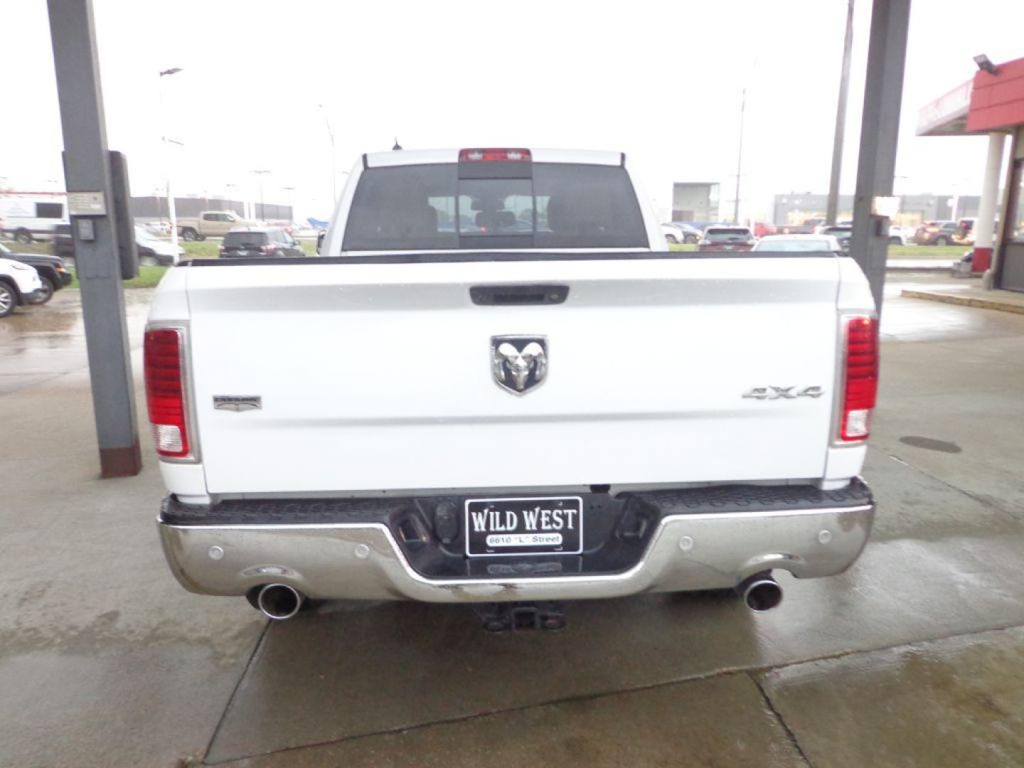 2014 WHITE RAM 1500 LARAMIE (1C6RR7VT9ES) with an 5.7L engine, Automatic transmission, located at 6610 L St., Omaha, NE, 68117, (402) 731-7800, 41.212872, -96.014702 - SHARP LARAMIE 2-OWNERS CLEAN CARFAX LOW MILEAGE LOADED WITH FRONT HEATED/COOLED SEATS, REAR HEATED SEATS, SUNROOF, NAV, BACKUP CAM, POWER REAR WINDOW, ALPINE AUDIO, REMOTE START AND MUCH MORE! *****We have found that most customers do the majority of their shopping online before visiting a de - Photo#4