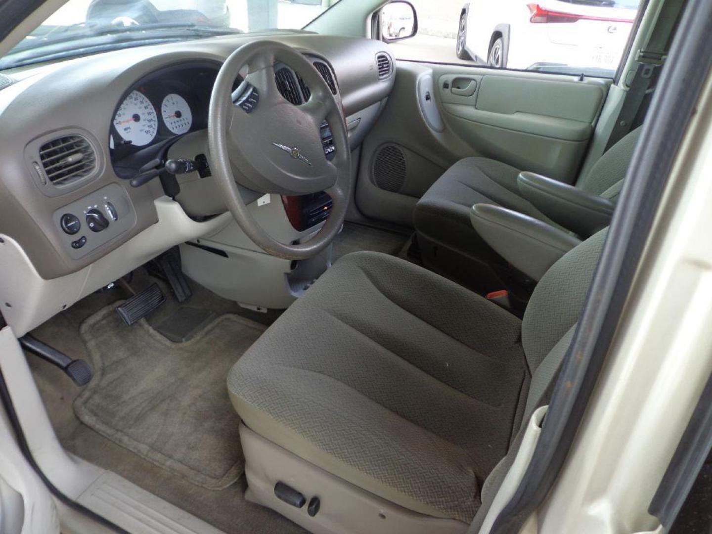 2006 TAN CHRYSLER TOWN and COUNTRY (1A4GP45R36B) with an 3.3L engine, Automatic transmission, located at 6610 L St., Omaha, NE, 68117, (402) 731-7800, 41.212872, -96.014702 - THIS VAN RUNS AND DRIVES GOOD WITH LOW MILEAGE AND COLD A/C. EXTERIOR IS RUSTY AND INTERIOR IS IN VERY GOOD CONDITION. *****We have found that most customers do the majority of their shopping online before visiting a dealership. For this reason we feel it necessary to have a competitive pric - Photo#9