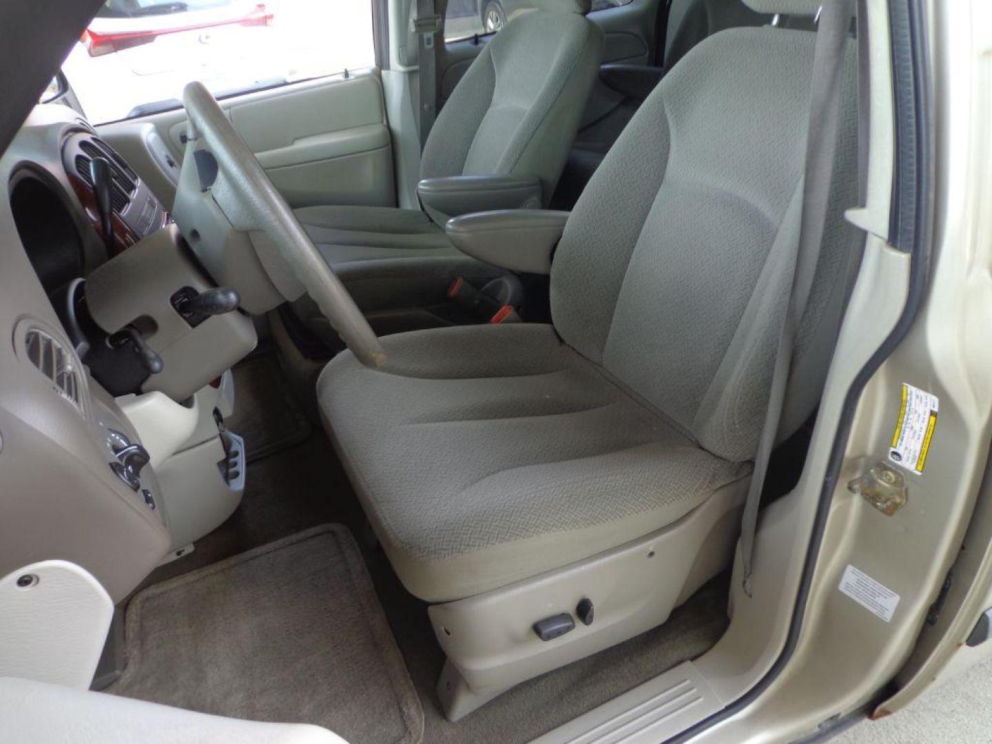 2006 TAN CHRYSLER TOWN and COUNTRY (1A4GP45R36B) with an 3.3L engine, Automatic transmission, located at 6610 L St., Omaha, NE, 68117, (402) 731-7800, 41.212872, -96.014702 - THIS VAN RUNS AND DRIVES GOOD WITH LOW MILEAGE AND COLD A/C. EXTERIOR IS RUSTY AND INTERIOR IS IN VERY GOOD CONDITION. *****We have found that most customers do the majority of their shopping online before visiting a dealership. For this reason we feel it necessary to have a competitive pric - Photo#10