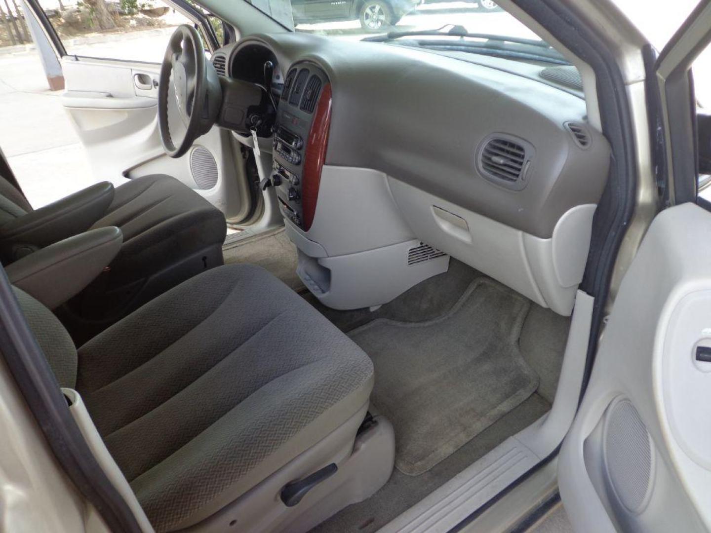 2006 TAN CHRYSLER TOWN and COUNTRY (1A4GP45R36B) with an 3.3L engine, Automatic transmission, located at 6610 L St., Omaha, NE, 68117, (402) 731-7800, 41.212872, -96.014702 - THIS VAN RUNS AND DRIVES GOOD WITH LOW MILEAGE AND COLD A/C. EXTERIOR IS RUSTY AND INTERIOR IS IN VERY GOOD CONDITION. *****We have found that most customers do the majority of their shopping online before visiting a dealership. For this reason we feel it necessary to have a competitive pric - Photo#12