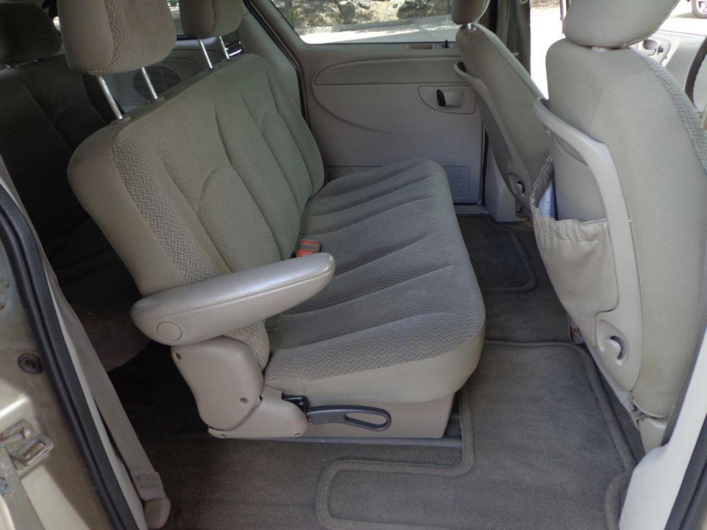 2006 TAN CHRYSLER TOWN and COUNTRY (1A4GP45R36B) with an 3.3L engine, Automatic transmission, located at 6610 L St., Omaha, NE, 68117, (402) 731-7800, 41.212872, -96.014702 - THIS VAN RUNS AND DRIVES GOOD WITH LOW MILEAGE AND COLD A/C. EXTERIOR IS RUSTY AND INTERIOR IS IN VERY GOOD CONDITION. *****We have found that most customers do the majority of their shopping online before visiting a dealership. For this reason we feel it necessary to have a competitive pric - Photo#14