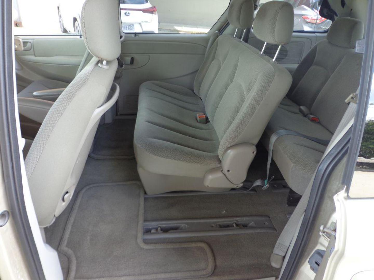 2006 TAN CHRYSLER TOWN and COUNTRY (1A4GP45R36B) with an 3.3L engine, Automatic transmission, located at 6610 L St., Omaha, NE, 68117, (402) 731-7800, 41.212872, -96.014702 - THIS VAN RUNS AND DRIVES GOOD WITH LOW MILEAGE AND COLD A/C. EXTERIOR IS RUSTY AND INTERIOR IS IN VERY GOOD CONDITION. *****We have found that most customers do the majority of their shopping online before visiting a dealership. For this reason we feel it necessary to have a competitive pric - Photo#17