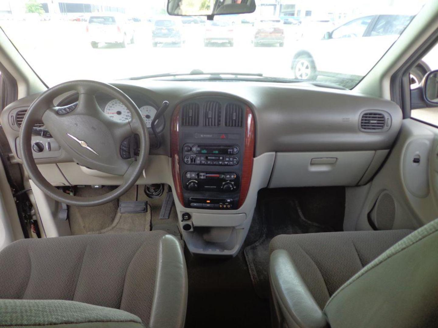 2006 TAN CHRYSLER TOWN and COUNTRY (1A4GP45R36B) with an 3.3L engine, Automatic transmission, located at 6610 L St., Omaha, NE, 68117, (402) 731-7800, 41.212872, -96.014702 - THIS VAN RUNS AND DRIVES GOOD WITH LOW MILEAGE AND COLD A/C. EXTERIOR IS RUSTY AND INTERIOR IS IN VERY GOOD CONDITION. *****We have found that most customers do the majority of their shopping online before visiting a dealership. For this reason we feel it necessary to have a competitive pric - Photo#18