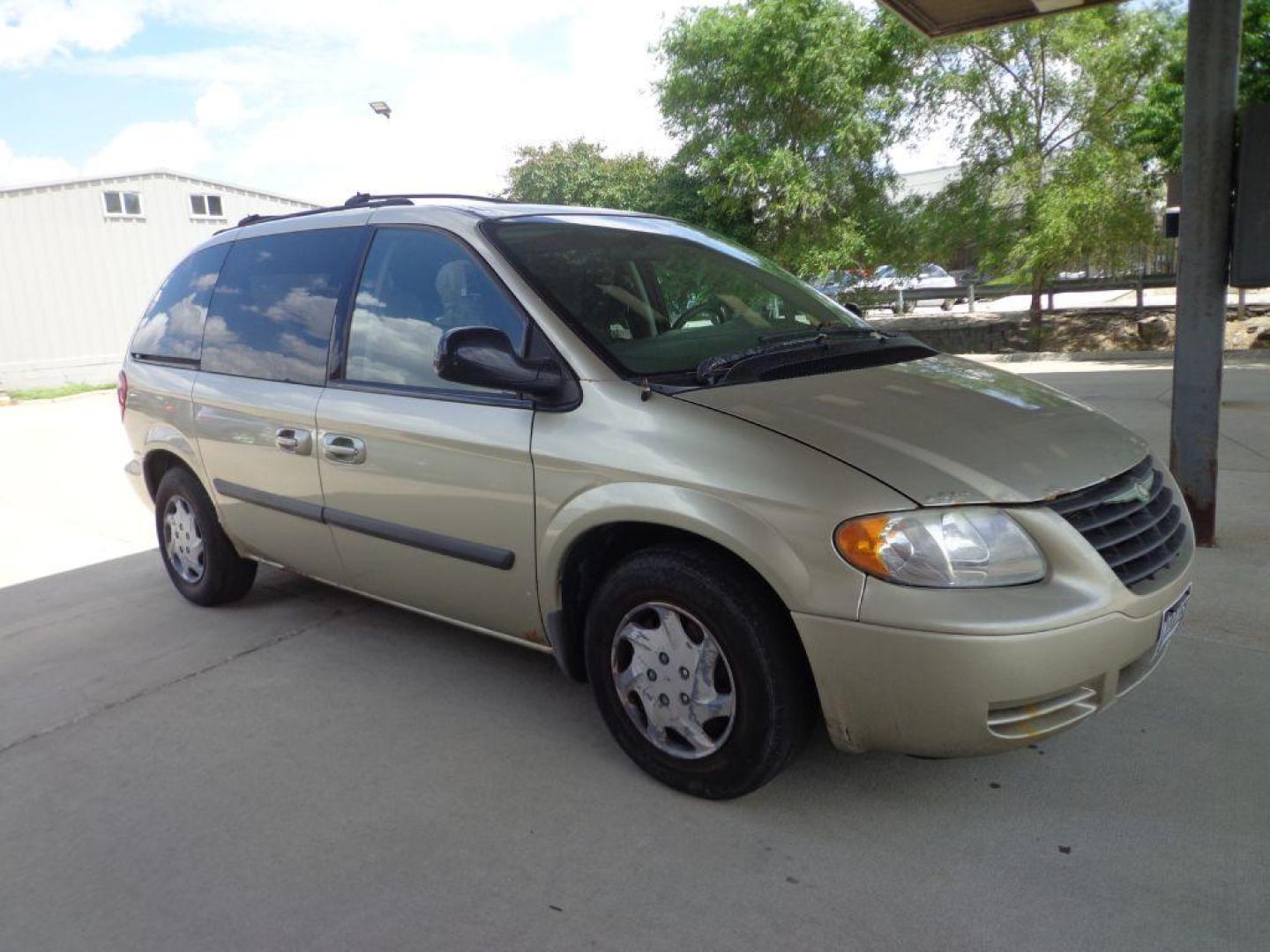 2006 TAN CHRYSLER TOWN and COUNTRY (1A4GP45R36B) with an 3.3L engine, Automatic transmission, located at 6610 L St., Omaha, NE, 68117, (402) 731-7800, 41.212872, -96.014702 - THIS VAN RUNS AND DRIVES GOOD WITH LOW MILEAGE AND COLD A/C. EXTERIOR IS RUSTY AND INTERIOR IS IN VERY GOOD CONDITION. *****We have found that most customers do the majority of their shopping online before visiting a dealership. For this reason we feel it necessary to have a competitive pric - Photo#2