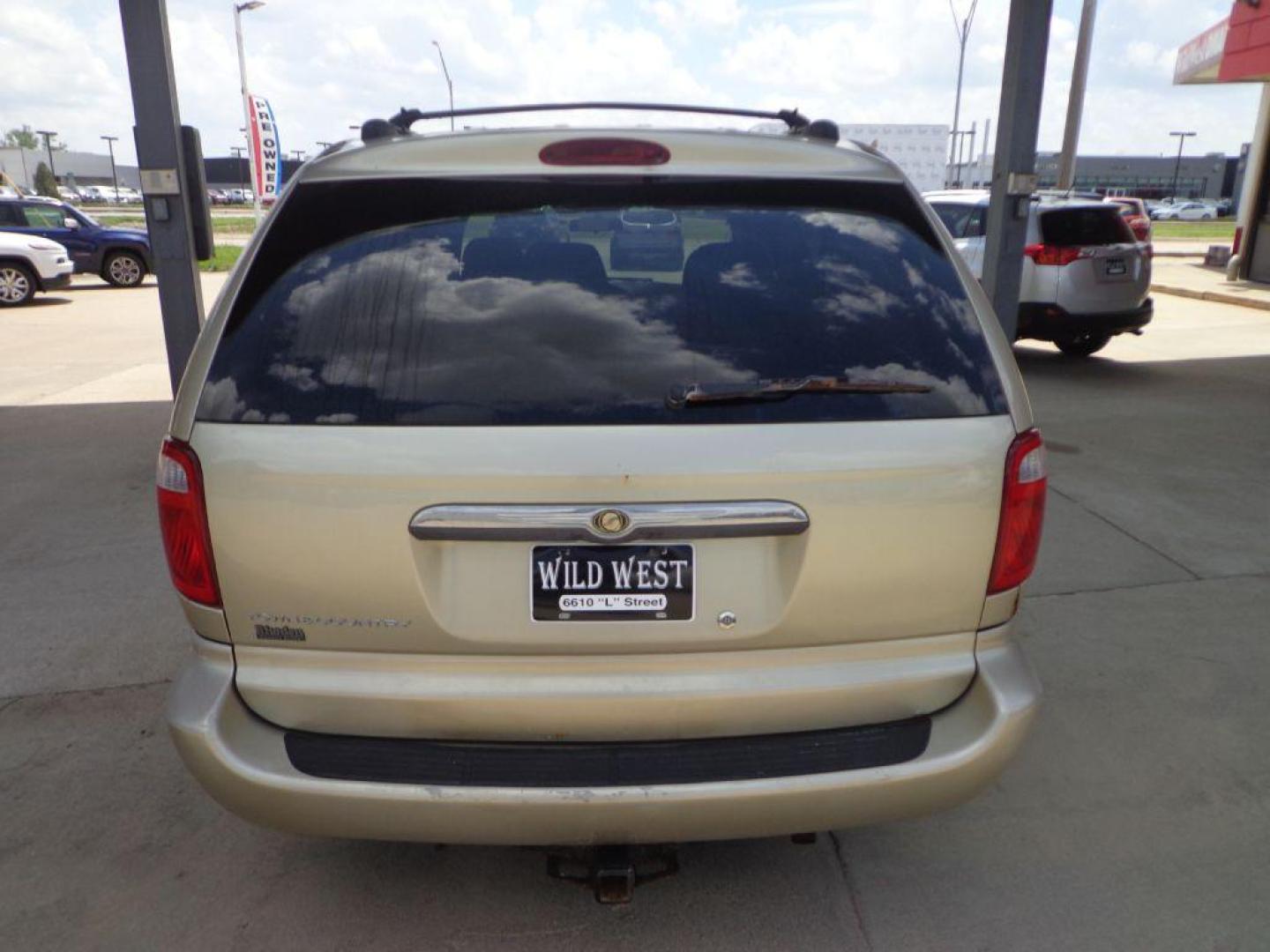 2006 TAN CHRYSLER TOWN and COUNTRY (1A4GP45R36B) with an 3.3L engine, Automatic transmission, located at 6610 L St., Omaha, NE, 68117, (402) 731-7800, 41.212872, -96.014702 - THIS VAN RUNS AND DRIVES GOOD WITH LOW MILEAGE AND COLD A/C. EXTERIOR IS RUSTY AND INTERIOR IS IN VERY GOOD CONDITION. *****We have found that most customers do the majority of their shopping online before visiting a dealership. For this reason we feel it necessary to have a competitive pric - Photo#4