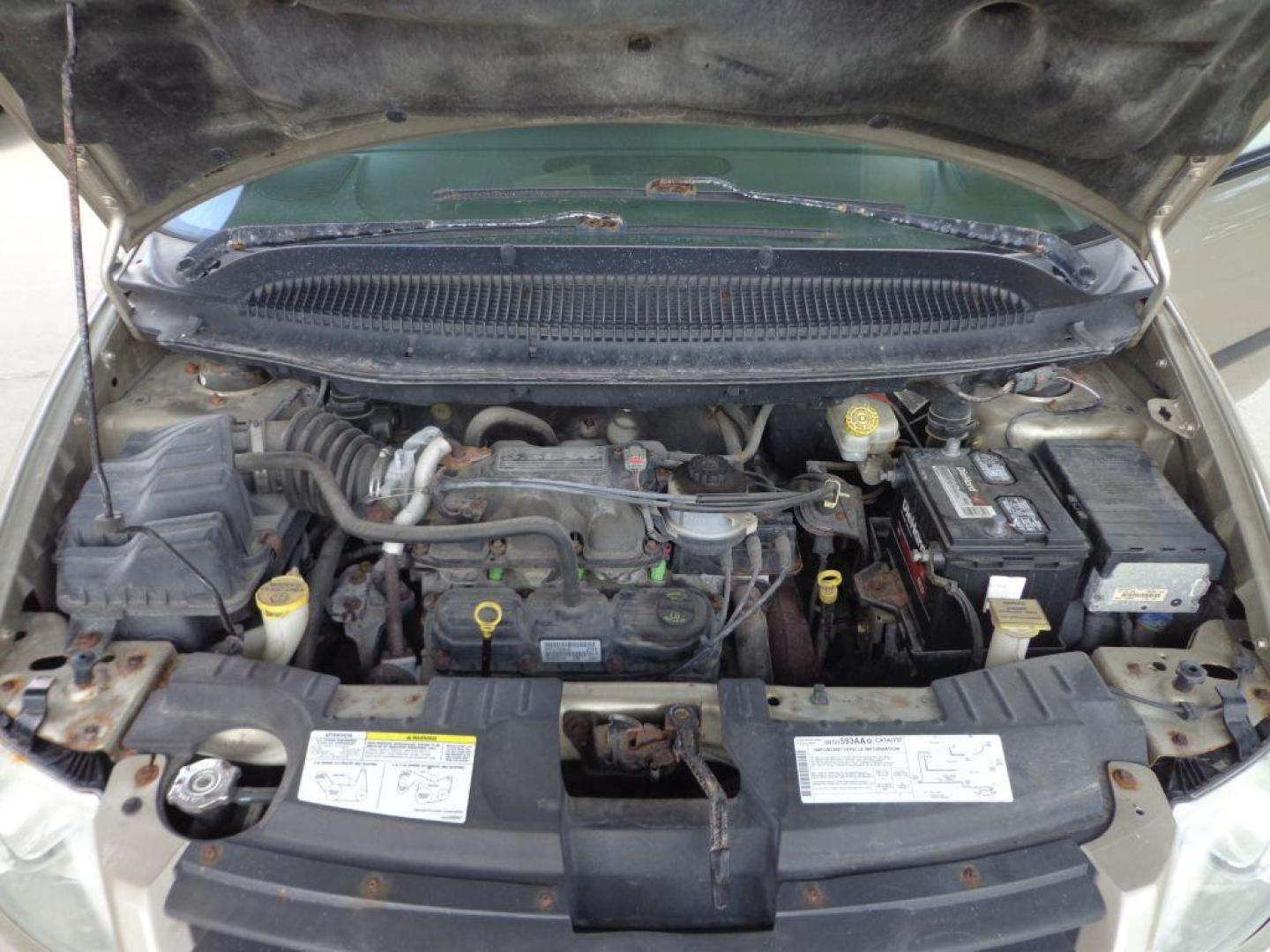 2006 TAN CHRYSLER TOWN and COUNTRY (1A4GP45R36B) with an 3.3L engine, Automatic transmission, located at 6610 L St., Omaha, NE, 68117, (402) 731-7800, 41.212872, -96.014702 - THIS VAN RUNS AND DRIVES GOOD WITH LOW MILEAGE AND COLD A/C. EXTERIOR IS RUSTY AND INTERIOR IS IN VERY GOOD CONDITION. *****We have found that most customers do the majority of their shopping online before visiting a dealership. For this reason we feel it necessary to have a competitive pric - Photo#7
