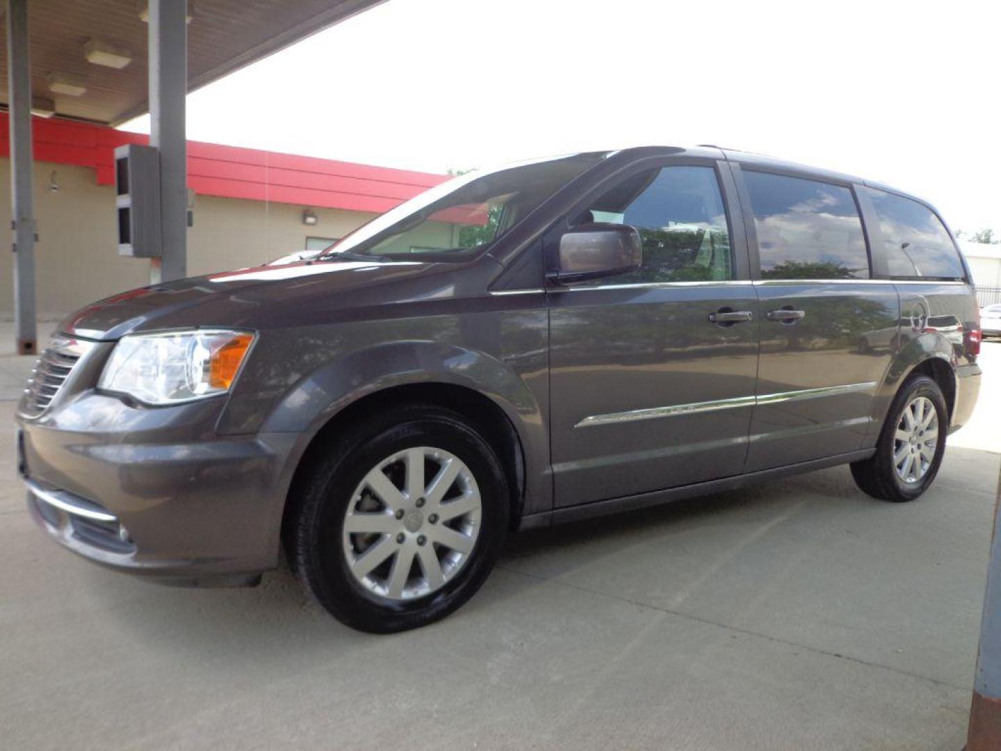 2016 GRAY CHRYSLER TOWN and COUNTRY TOURING (2C4RC1BGXGR) with an 3.6L engine, Automatic transmission, located at 6610 L St., Omaha, NE, 68117, (402) 731-7800, 41.212872, -96.014702 - SHARP TOURING MODEL WITH A CLEAN CARFAX, LOW MILEAGE, REAR ENTERTAINMENT, BACKUP CAM AND NEWER TIRES! *****We have found that most customers do the majority of their shopping online before visiting a dealership. For this reason we feel it necessary to have a competitive price on our used vehi - Photo#0