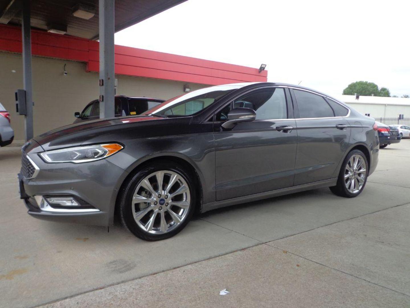 2017 GRAY FORD FUSION TITANIUM (3FA6P0K95HR) with an 2.0L engine, Automatic transmission, located at 6610 L St., Omaha, NE, 68117, (402) 731-7800, 41.212872, -96.014702 - SHARP TITANIUM PACKAGE WITH A CLEAN CARFAX, LOW MILES, ALL THE OPTIONS AND NEWER TIRES! *****We have found that most customers do the majority of their shopping online before visiting a dealership. For this reason we feel it necessary to have a competitive price on our used vehicles right up - Photo#0