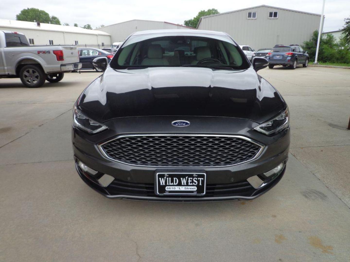 2017 GRAY FORD FUSION TITANIUM (3FA6P0K95HR) with an 2.0L engine, Automatic transmission, located at 6610 L St., Omaha, NE, 68117, (402) 731-7800, 41.212872, -96.014702 - SHARP TITANIUM PACKAGE WITH A CLEAN CARFAX, LOW MILES, ALL THE OPTIONS AND NEWER TIRES! *****We have found that most customers do the majority of their shopping online before visiting a dealership. For this reason we feel it necessary to have a competitive price on our used vehicles right up - Photo#1