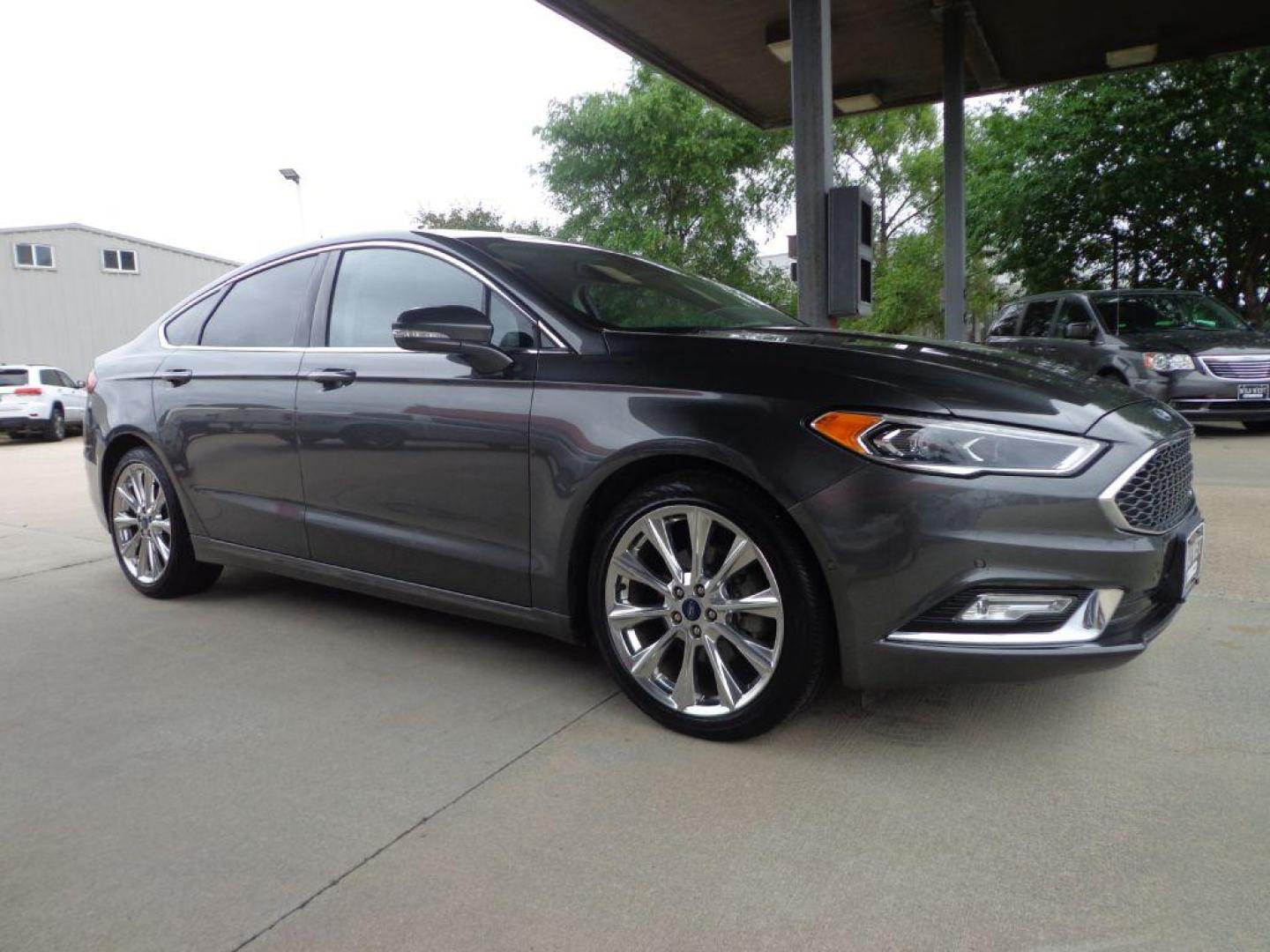 2017 GRAY FORD FUSION TITANIUM (3FA6P0K95HR) with an 2.0L engine, Automatic transmission, located at 6610 L St., Omaha, NE, 68117, (402) 731-7800, 41.212872, -96.014702 - SHARP TITANIUM PACKAGE WITH A CLEAN CARFAX, LOW MILES, ALL THE OPTIONS AND NEWER TIRES! *****We have found that most customers do the majority of their shopping online before visiting a dealership. For this reason we feel it necessary to have a competitive price on our used vehicles right up - Photo#2