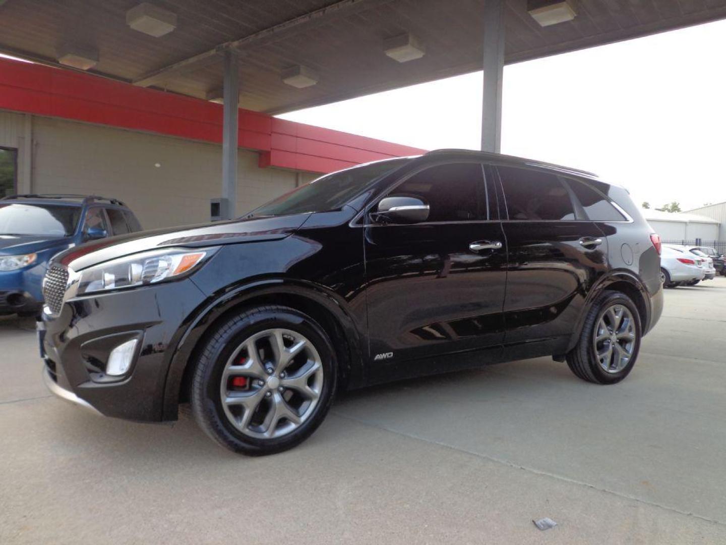 2016 BLACK KIA SORENTO SX (5XYPKDA50GG) with an 3.3L engine, Automatic transmission, located at 6610 L St., Omaha, NE, 68117, (402) 731-7800, 41.212872, -96.014702 - SHARP 2-OWNER, CLEAN CARFAX, SX PREMIUM PACKAGE, LOADED WITH HEATED LEATHER, PANORAMIC ROOF, NAV, BACKUP CAM, 3RD ROW SEATING, BLIND SPOT ASSIST, INFINITI AUDIO AND NEWER TIRES! *****We have found that most customers do the majority of their shopping online before visiting a dealership. For - Photo#0