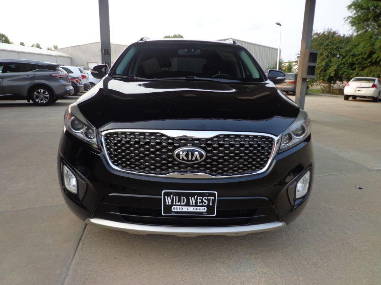 2016 BLACK KIA SORENTO SX (5XYPKDA50GG) with an 3.3L engine, Automatic transmission, located at 6610 L St., Omaha, NE, 68117, (402) 731-7800, 41.212872, -96.014702 - SHARP 2-OWNER, CLEAN CARFAX, SX PREMIUM PACKAGE, LOADED WITH HEATED LEATHER, PANORAMIC ROOF, NAV, BACKUP CAM, 3RD ROW SEATING, BLIND SPOT ASSIST, INFINITI AUDIO AND NEWER TIRES! *****We have found that most customers do the majority of their shopping online before visiting a dealership. For - Photo#1