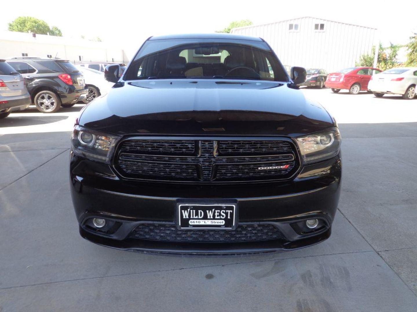 2015 BLACK DODGE DURANGO LIMITED (1C4RDJDG4FC) with an 3.6L engine, Automatic transmission, located at 6610 L St., Omaha, NE, 68117, (402) 731-7800, 41.212872, -96.014702 - Photo#1