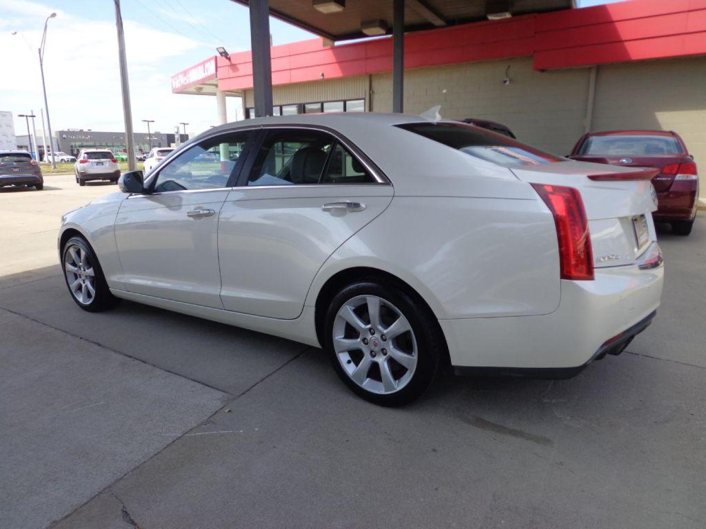 2013 WHITE CADILLAC ATS PREMIUM (1G6AL5SX3D0) with an 2.0L engine, Automatic transmission, located at 6610 L St., Omaha, NE, 68117, (402) 731-7800, 41.212872, -96.014702 - SHARP 2-OWNER CLEAN CARFAX LOW MILEAGE PREMIUM PACKAGE LOADED WITH OPTIONS AND NEWER TIRES! *****We have found that most customers do the majority of their shopping online before visiting a dealership. For this reason we feel it necessary to have a competitive price on our used vehicles righ - Photo#5
