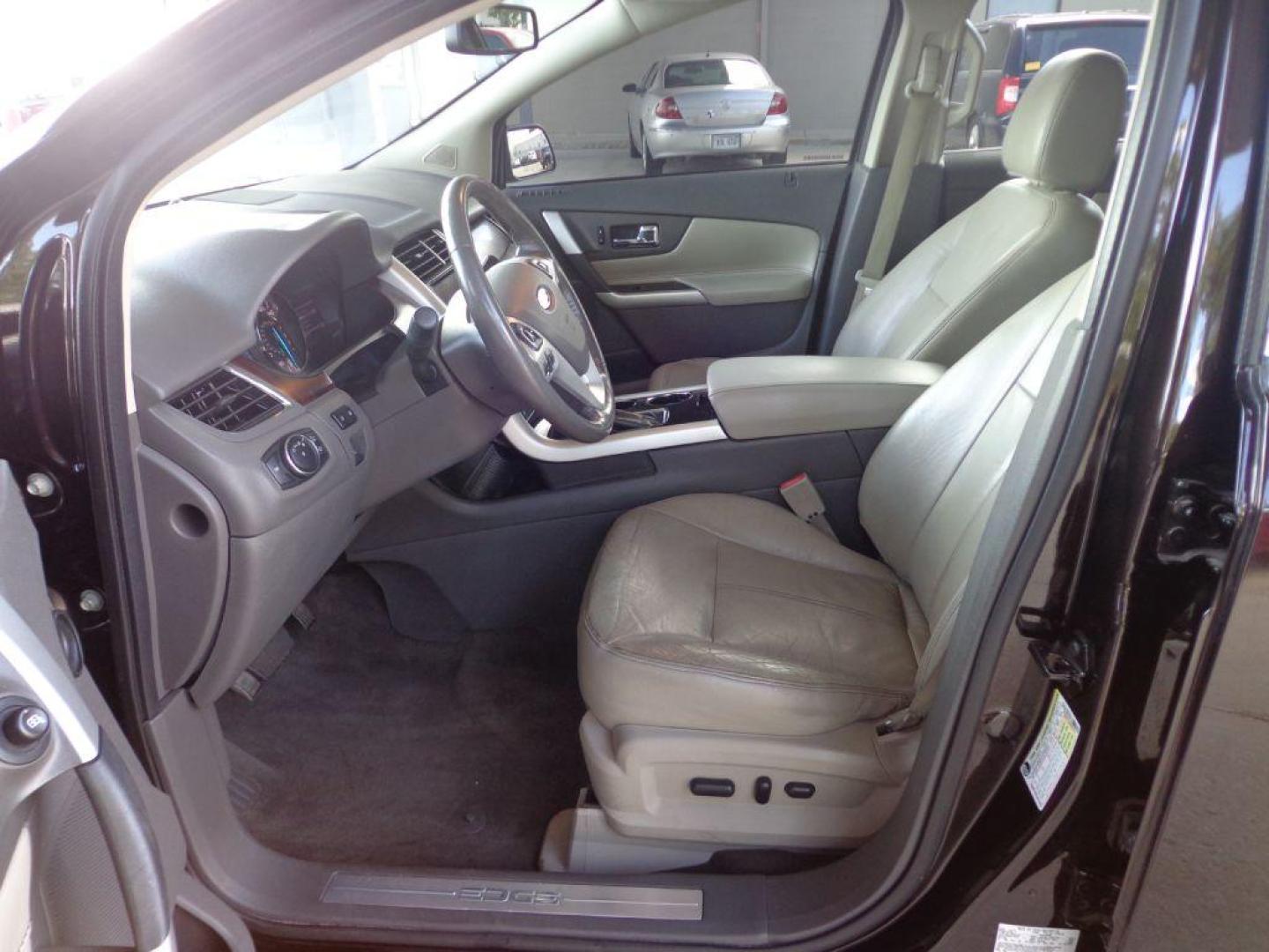 2013 BLACK FORD EDGE LIMITED (2FMDK4KC2DB) with an 3.5L engine, Automatic transmission, located at 6610 L St., Omaha, NE, 68117, (402) 731-7800, 41.212872, -96.014702 - SHARP LIMITED WITH LOW MILEAGE, CLEAN CARFAX, NAV, BACKUP CAM, PANORAMIC ROOF, BLIND SPOT ASSIST, ADAPTIVE CRUISE AND NEWER TIRES! *****We have found that most customers do the majority of their shopping online before visiting a dealership. For this reason we feel it necessary to have a compe - Photo#9