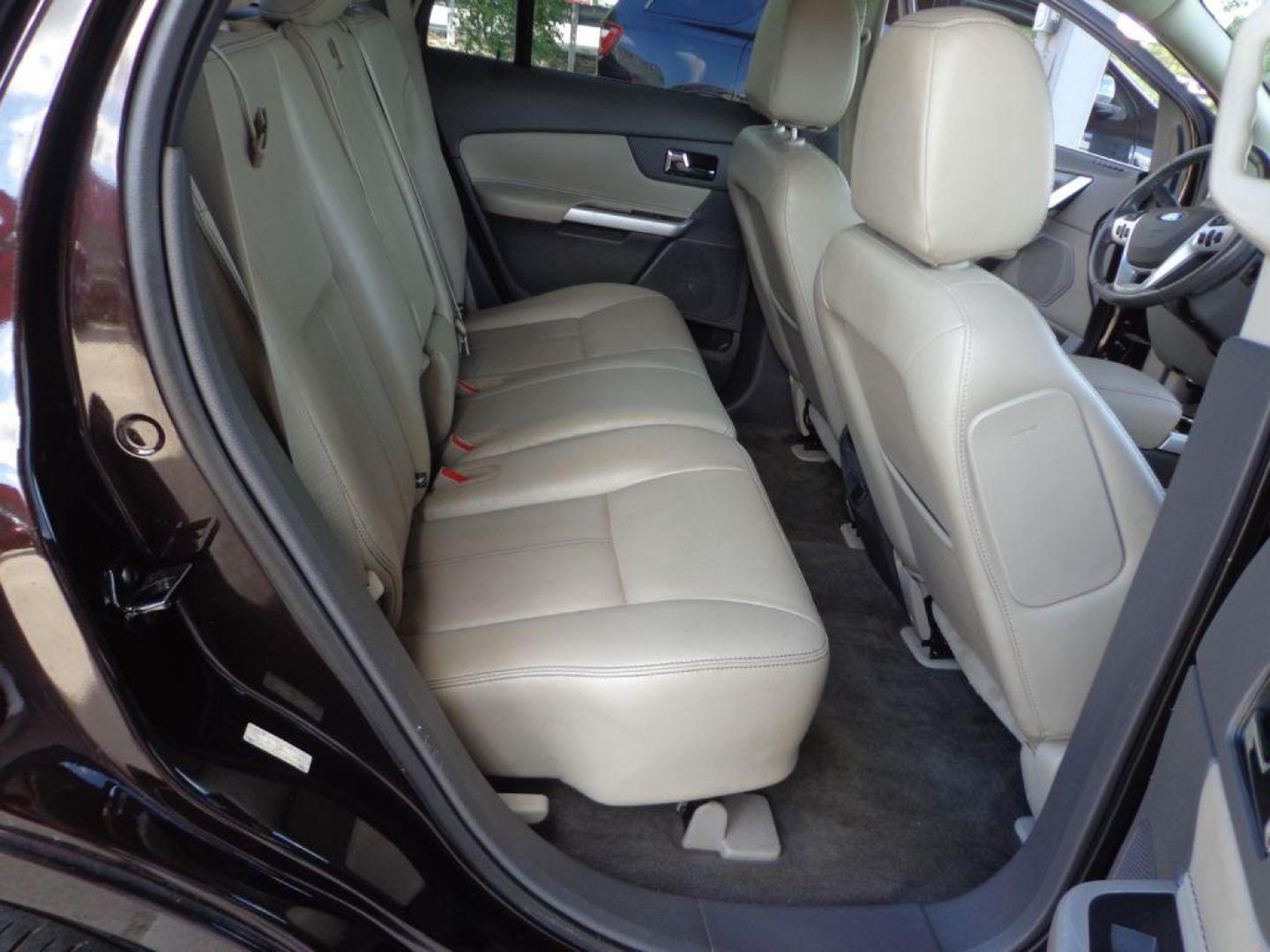 2013 BLACK FORD EDGE LIMITED (2FMDK4KC2DB) with an 3.5L engine, Automatic transmission, located at 6610 L St., Omaha, NE, 68117, (402) 731-7800, 41.212872, -96.014702 - SHARP LIMITED WITH LOW MILEAGE, CLEAN CARFAX, NAV, BACKUP CAM, PANORAMIC ROOF, BLIND SPOT ASSIST, ADAPTIVE CRUISE AND NEWER TIRES! *****We have found that most customers do the majority of their shopping online before visiting a dealership. For this reason we feel it necessary to have a compe - Photo#15