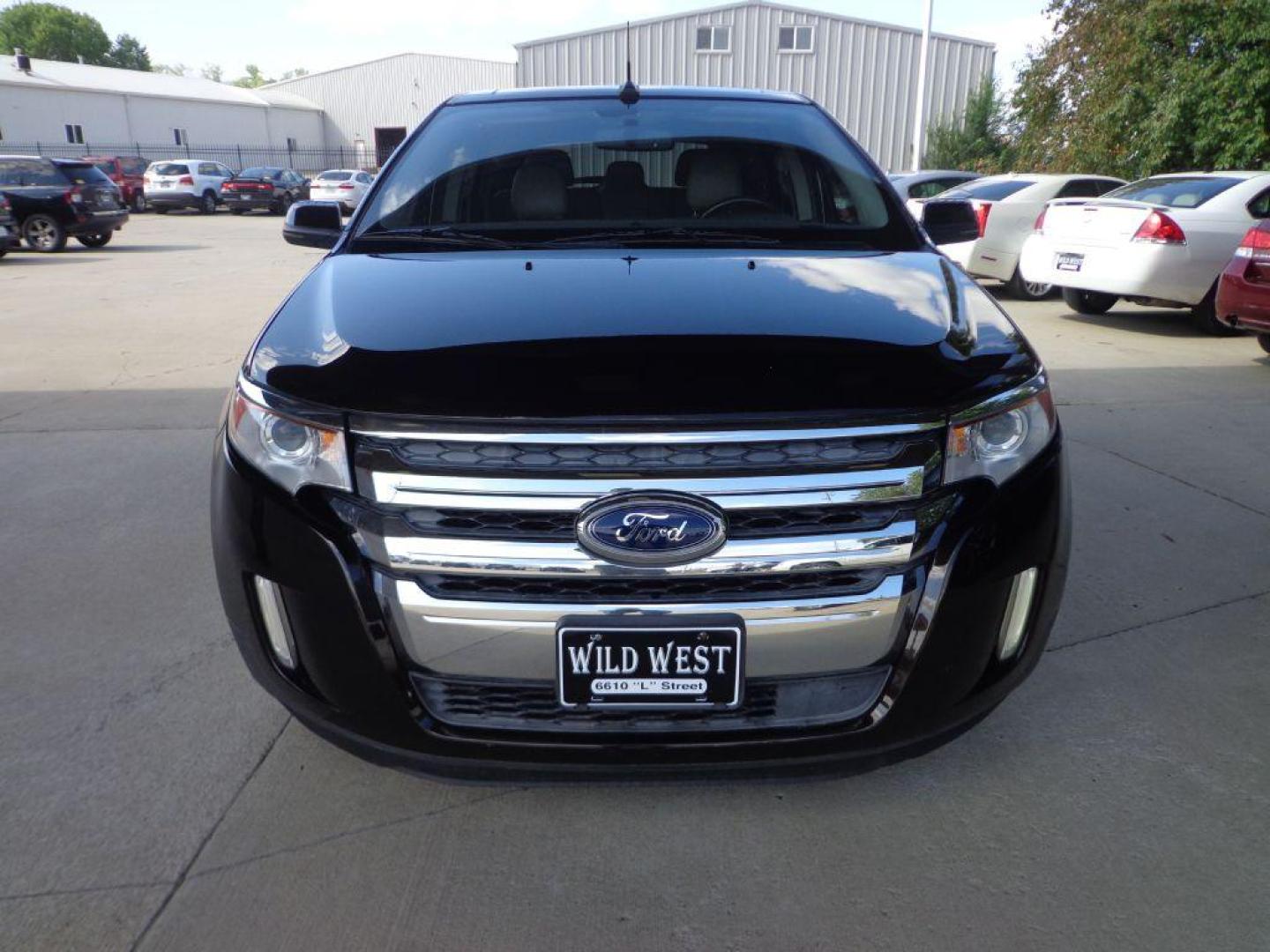 2013 BLACK FORD EDGE LIMITED (2FMDK4KC2DB) with an 3.5L engine, Automatic transmission, located at 6610 L St., Omaha, NE, 68117, (402) 731-7800, 41.212872, -96.014702 - SHARP LIMITED WITH LOW MILEAGE, CLEAN CARFAX, NAV, BACKUP CAM, PANORAMIC ROOF, BLIND SPOT ASSIST, ADAPTIVE CRUISE AND NEWER TIRES! *****We have found that most customers do the majority of their shopping online before visiting a dealership. For this reason we feel it necessary to have a compe - Photo#1