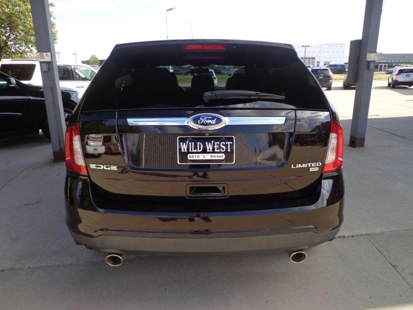 2013 BLACK FORD EDGE LIMITED (2FMDK4KC2DB) with an 3.5L engine, Automatic transmission, located at 6610 L St., Omaha, NE, 68117, (402) 731-7800, 41.212872, -96.014702 - SHARP LIMITED WITH LOW MILEAGE, CLEAN CARFAX, NAV, BACKUP CAM, PANORAMIC ROOF, BLIND SPOT ASSIST, ADAPTIVE CRUISE AND NEWER TIRES! *****We have found that most customers do the majority of their shopping online before visiting a dealership. For this reason we feel it necessary to have a compe - Photo#4
