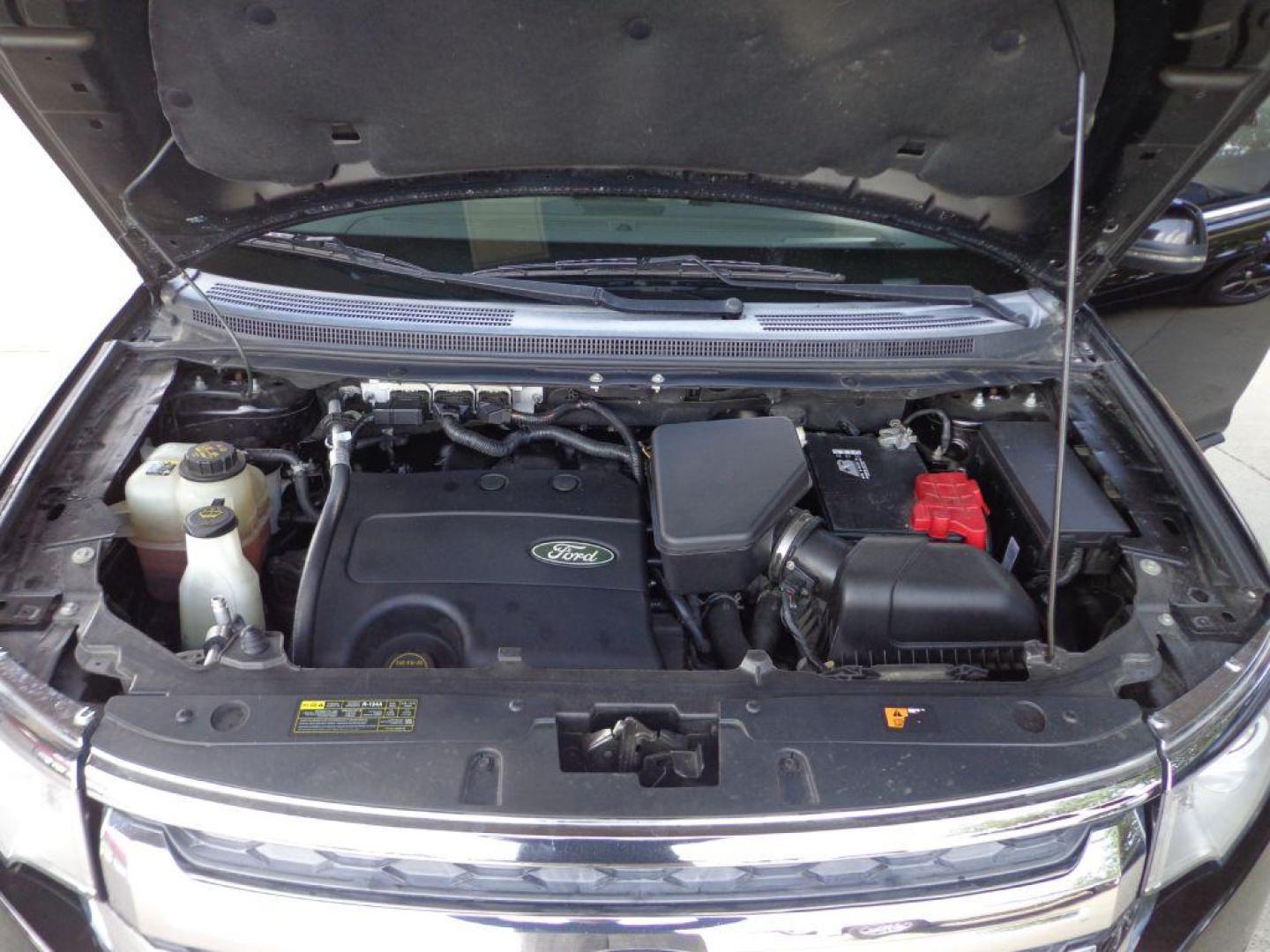 2013 BLACK FORD EDGE LIMITED (2FMDK4KC2DB) with an 3.5L engine, Automatic transmission, located at 6610 L St., Omaha, NE, 68117, (402) 731-7800, 41.212872, -96.014702 - SHARP LIMITED WITH LOW MILEAGE, CLEAN CARFAX, NAV, BACKUP CAM, PANORAMIC ROOF, BLIND SPOT ASSIST, ADAPTIVE CRUISE AND NEWER TIRES! *****We have found that most customers do the majority of their shopping online before visiting a dealership. For this reason we feel it necessary to have a compe - Photo#8