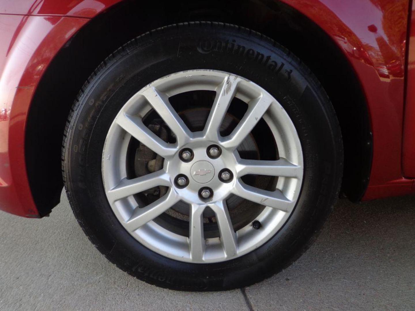2013 RED CHEVROLET SONIC LT (1G1JC5SH2D4) with an 1.8L engine, Automatic transmission, located at 6610 L St., Omaha, NE, 68117, (402) 731-7800, 41.212872, -96.014702 - 1-OWNER, CLEAN CARFAX , LOW MILEAGE WITH NEWER TIRES! *****We have found that most customers do the majority of their shopping online before visiting a dealership. For this reason we feel it necessary to have a competitive price on our used vehicles right up front. We spend time researching the - Photo#7