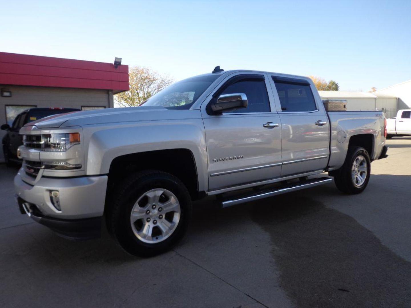 2016 SILVER CHEVROLET SILVERADO 1500 LTZ (3GCUKSECXGG) with an 5.3L engine, Automatic transmission, located at 6610 L St., Omaha, NE, 68117, (402) 731-7800, 41.212872, -96.014702 - 2-OWNER, CLEAN CARFAX, LOW MILEAGE LTZ WITH NEWER TIRES! *****We have found that most customers do the majority of their shopping online before visiting a dealership. For this reason we feel it necessary to have a competitive price on our used vehicles right up front. We spend time researchin - Photo#0