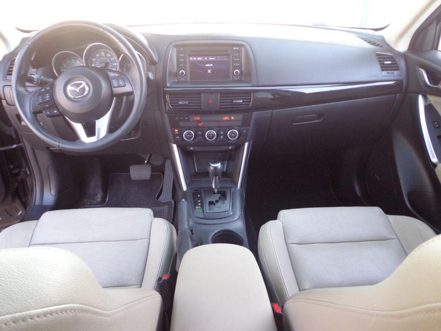 2013 BLACK MAZDA CX-5 GT (JM3KE4DEXD0) with an 2.0L engine, Automatic transmission, located at 6610 L St., Omaha, NE, 68117, (402) 731-7800, 41.212872, -96.014702 - SHARP CX-5 AWD WITH A CLEAN CARFAX, LOADED WITH HEATED LEATHER, SUNROOF, NAV, BACKUP CAM, NEWER TIRES AND MUCH MORE! *****We have found that most customers do the majority of their shopping online before visiting a dealership. For this reason we feel it necessary to have a competitive price on - Photo#17