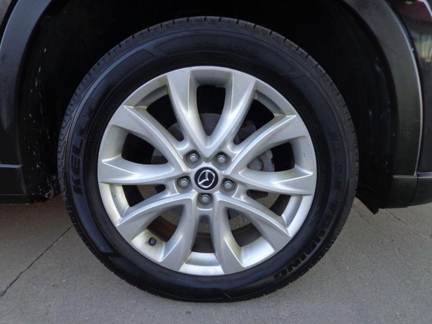 2013 BLACK MAZDA CX-5 GT (JM3KE4DEXD0) with an 2.0L engine, Automatic transmission, located at 6610 L St., Omaha, NE, 68117, (402) 731-7800, 41.212872, -96.014702 - SHARP CX-5 AWD WITH A CLEAN CARFAX, LOADED WITH HEATED LEATHER, SUNROOF, NAV, BACKUP CAM, NEWER TIRES AND MUCH MORE! *****We have found that most customers do the majority of their shopping online before visiting a dealership. For this reason we feel it necessary to have a competitive price on - Photo#8