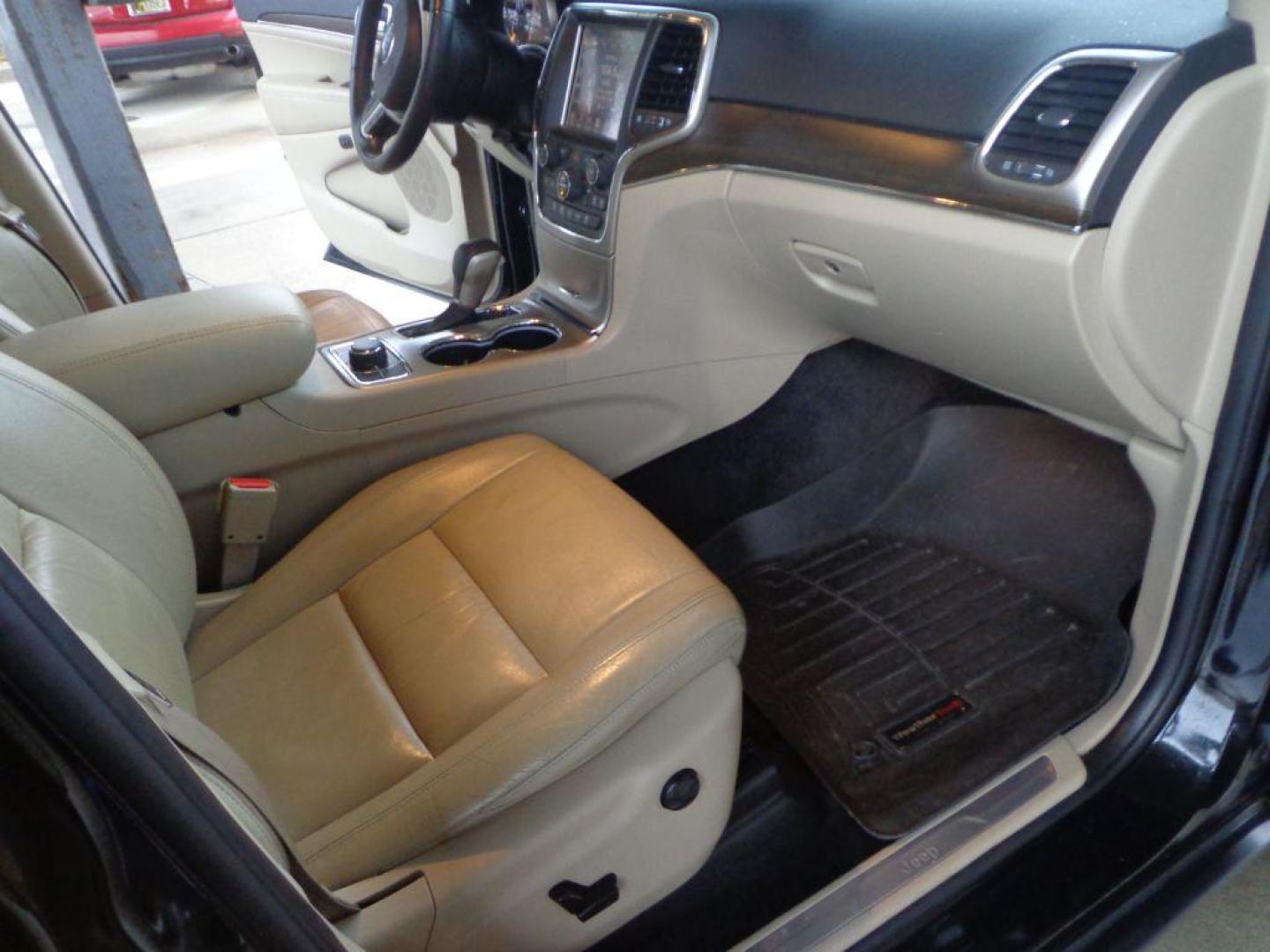 2016 BLACK JEEP GRAND CHEROKEE LIMITED (1C4RJFBG8GC) with an 3.6L engine, Automatic transmission, located at 6610 L St., Omaha, NE, 68117, (402) 731-7800, 41.212872, -96.014702 - 2-OWNER, CLEAN CARFAX, NAV, BACKUP CAM, SUNROOF AND NEWER TIRES! *****We have found that most customers do the majority of their shopping online before visiting a dealership. For this reason we feel it necessary to have a competitive price on our used vehicles right up front. We spend time rese - Photo#17