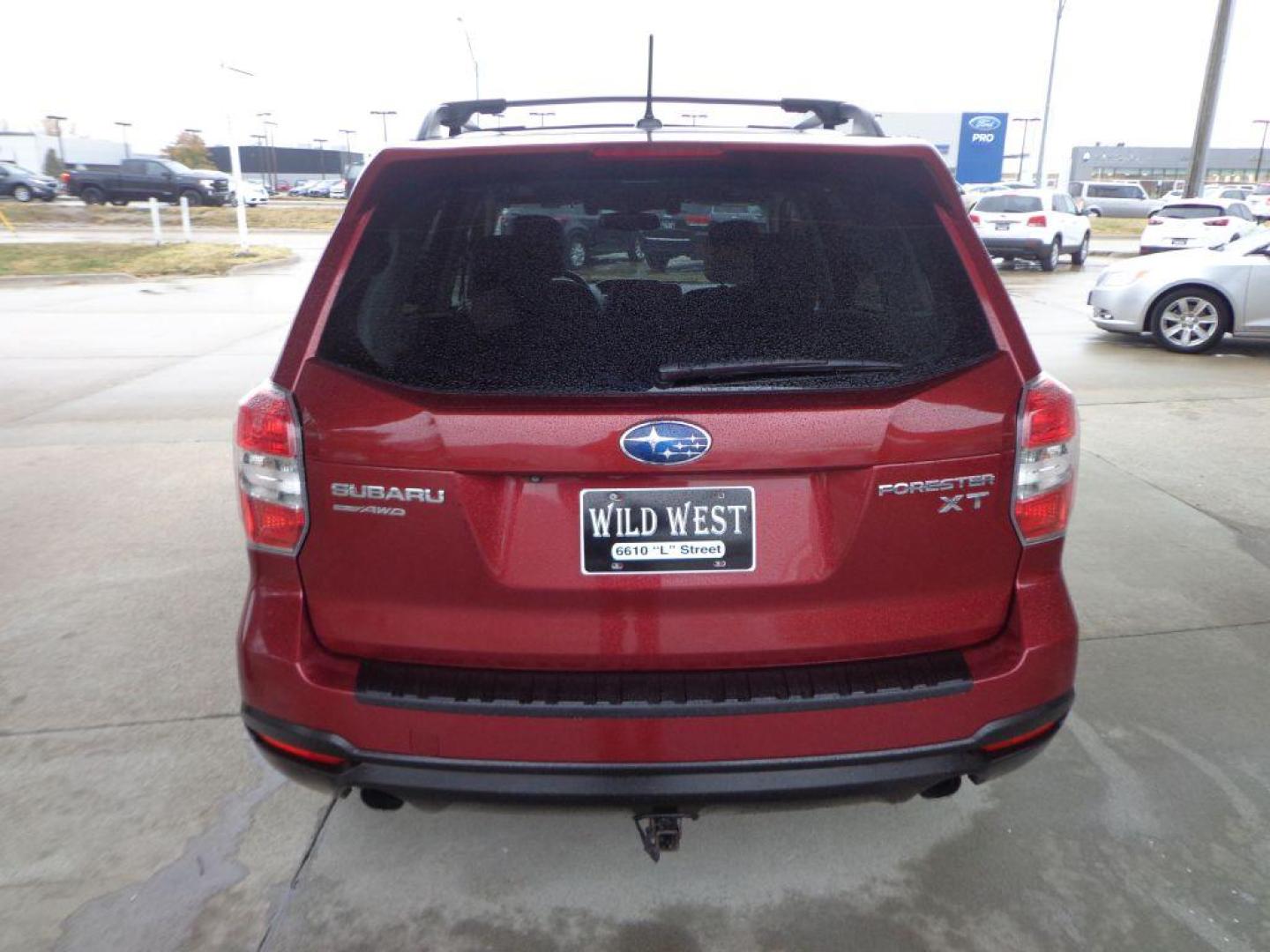 2015 MAROON SUBARU FORESTER 2.0XT TOURING (JF2SJGWC9FH) with an 2.0L engine, Continuously Variable transmission, located at 6610 L St., Omaha, NE, 68117, (402) 731-7800, 41.212872, -96.014702 - 2-OWNER, CLEAN CARFAX, LOW MILEAGE LOADED WITH OPTIONS AND NEWER TIRES! *****We have found that most customers do the majority of their shopping online before visiting a dealership. For this reason we feel it necessary to have a competitive price on our used vehicles right up front. We spend ti - Photo#4