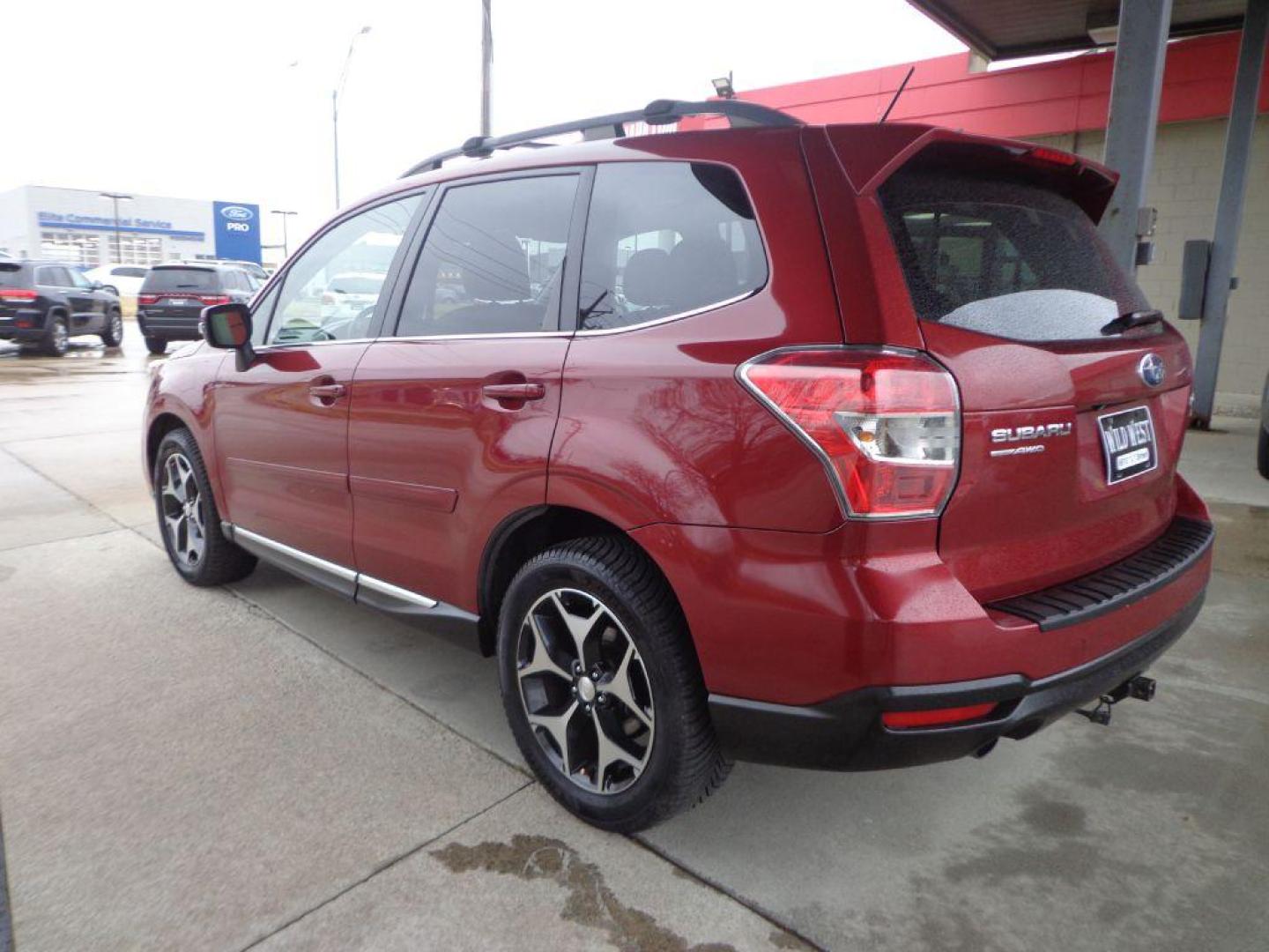 2015 MAROON SUBARU FORESTER 2.0XT TOURING (JF2SJGWC9FH) with an 2.0L engine, Continuously Variable transmission, located at 6610 L St., Omaha, NE, 68117, (402) 731-7800, 41.212872, -96.014702 - 2-OWNER, CLEAN CARFAX, LOW MILEAGE LOADED WITH OPTIONS AND NEWER TIRES! *****We have found that most customers do the majority of their shopping online before visiting a dealership. For this reason we feel it necessary to have a competitive price on our used vehicles right up front. We spend ti - Photo#5